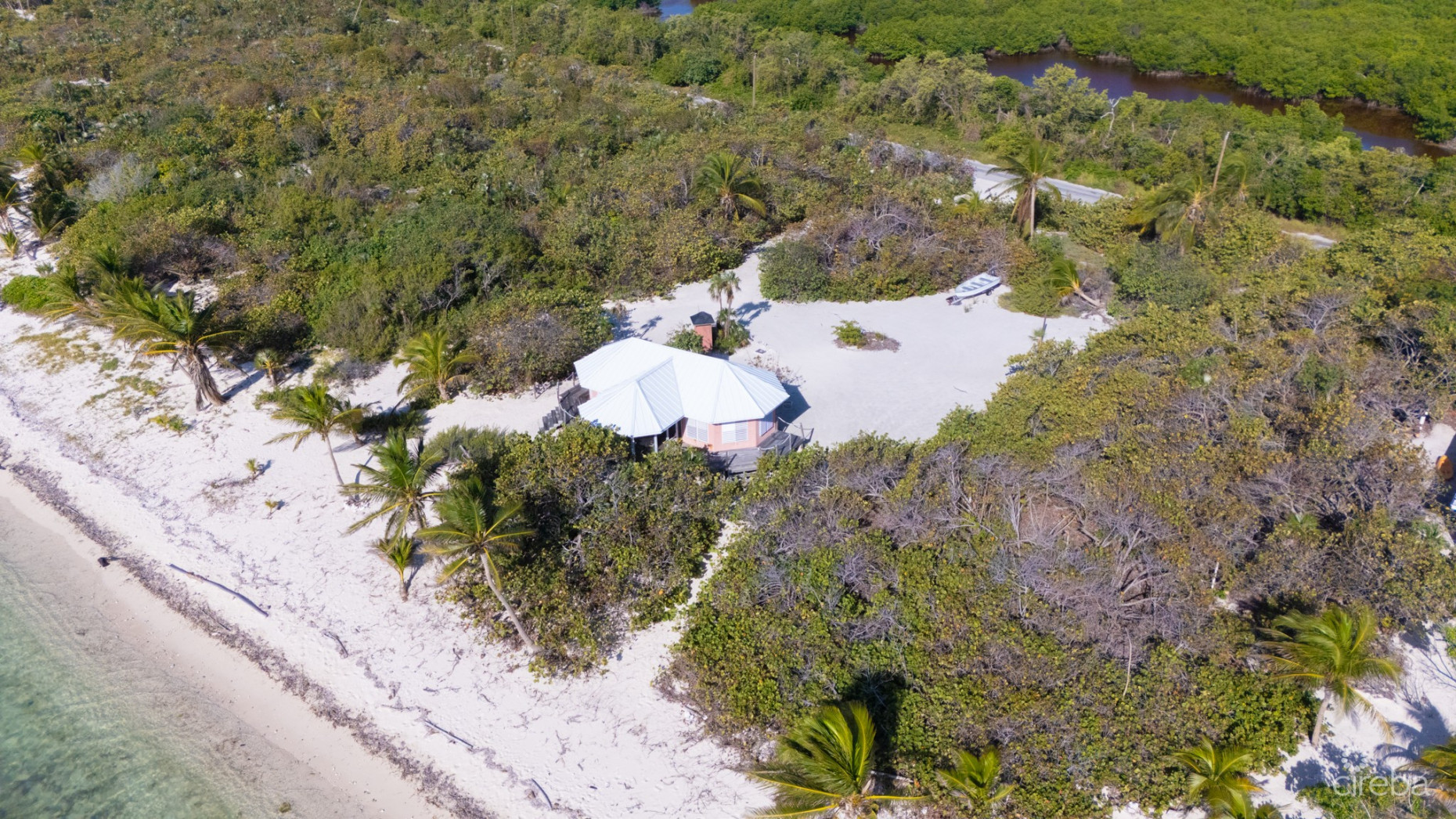LITTLE CAYMAN LAND WITH BEACHFRONT COTTAGE