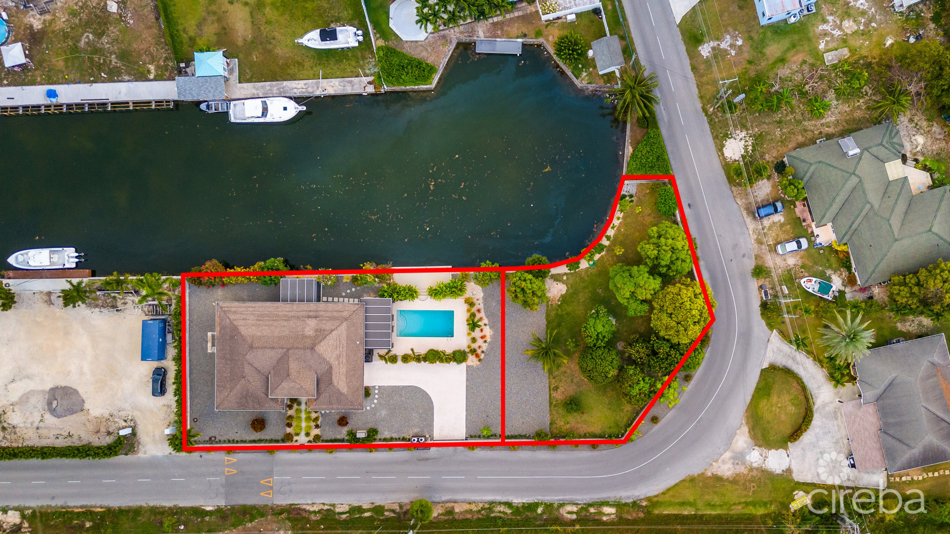 IMMACULATE 3BR FAMILY HOME W/ ADJACENT CANAL LOT