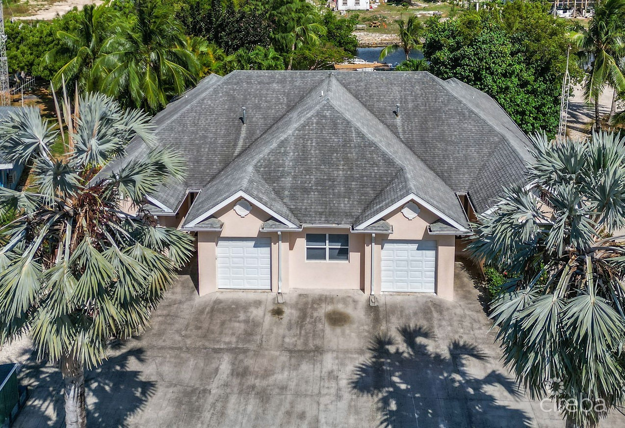 4,465 SF CANAL FRONT DUPLEX WITH POOL  (BOTH SIDES - OR INDIVIDUALLY)