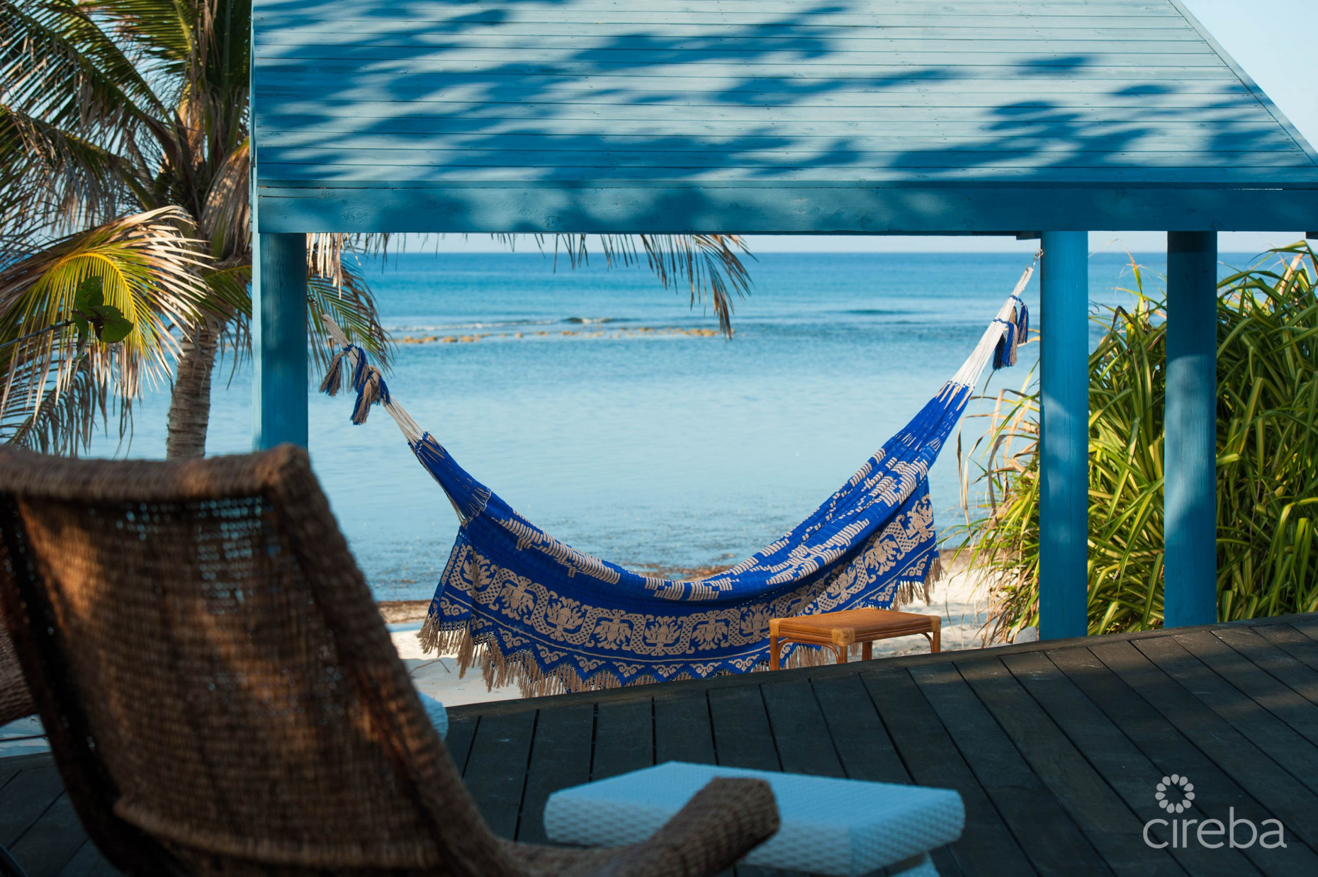 LITTLE CAYMAN BEACHFRONT HOME WITH 2 LOTS AND POOL