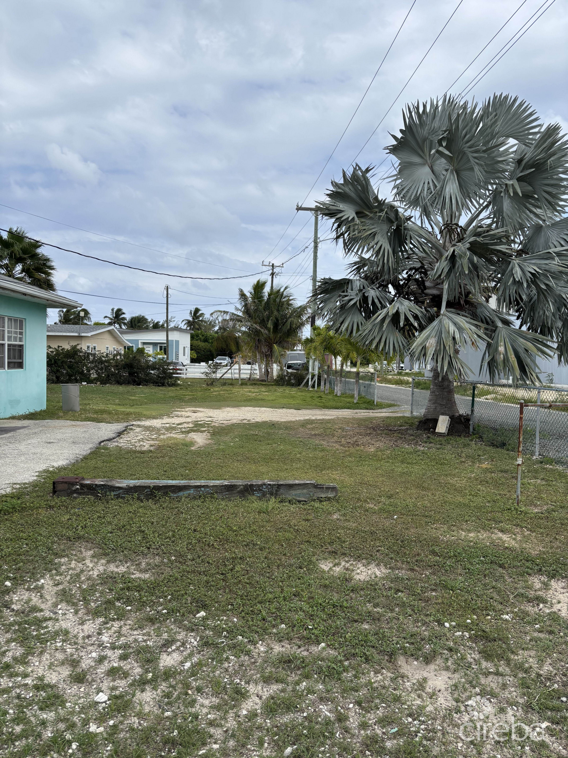 INCOME POTENTIAL! MULTI-UNIT RESIDENCE & CHURCH ON PRIME 1 ACRE