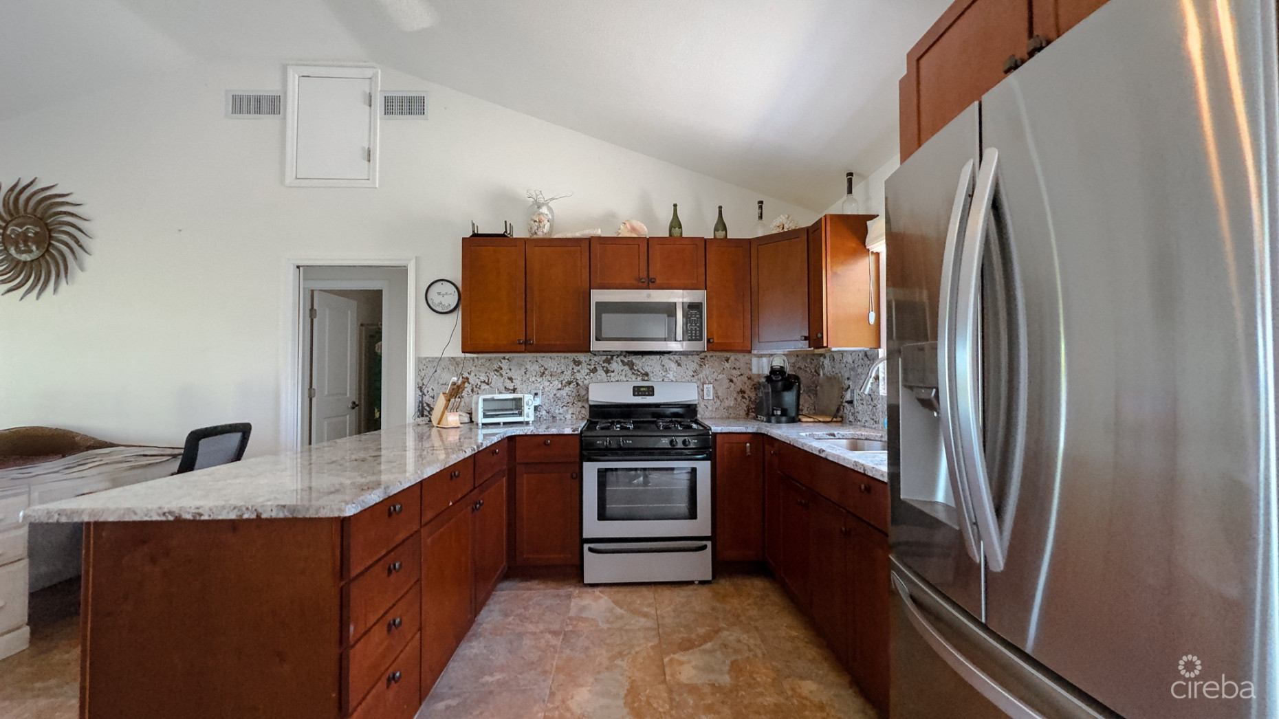 LITTLE CAYMAN OCEAN VIEW RESIDENTIAL HOME WITH BEACHFRONT LOT