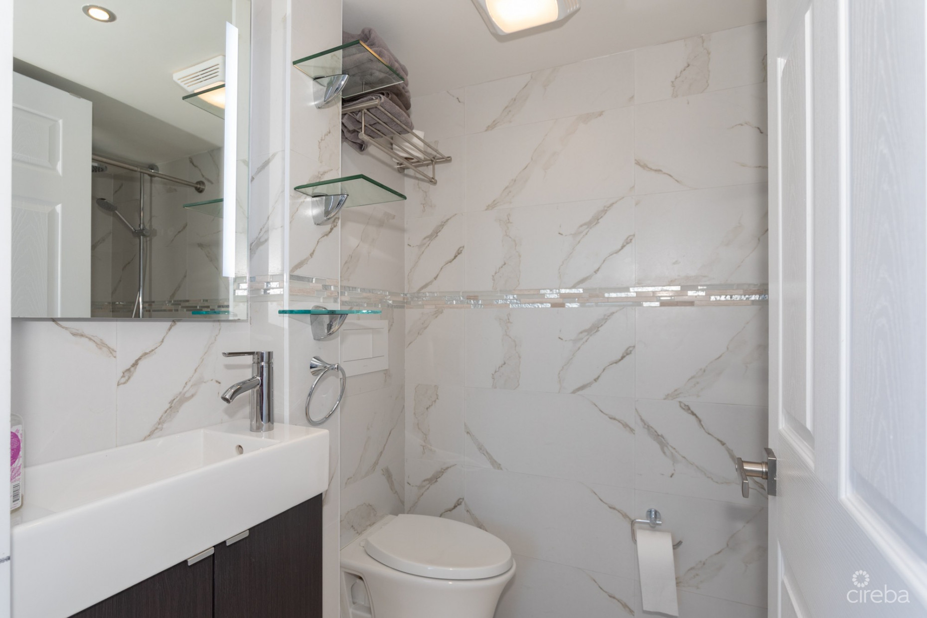 CAYMAN REEF RESORT BEACHFRONT WITH FUTURE REDEVELOPMENT