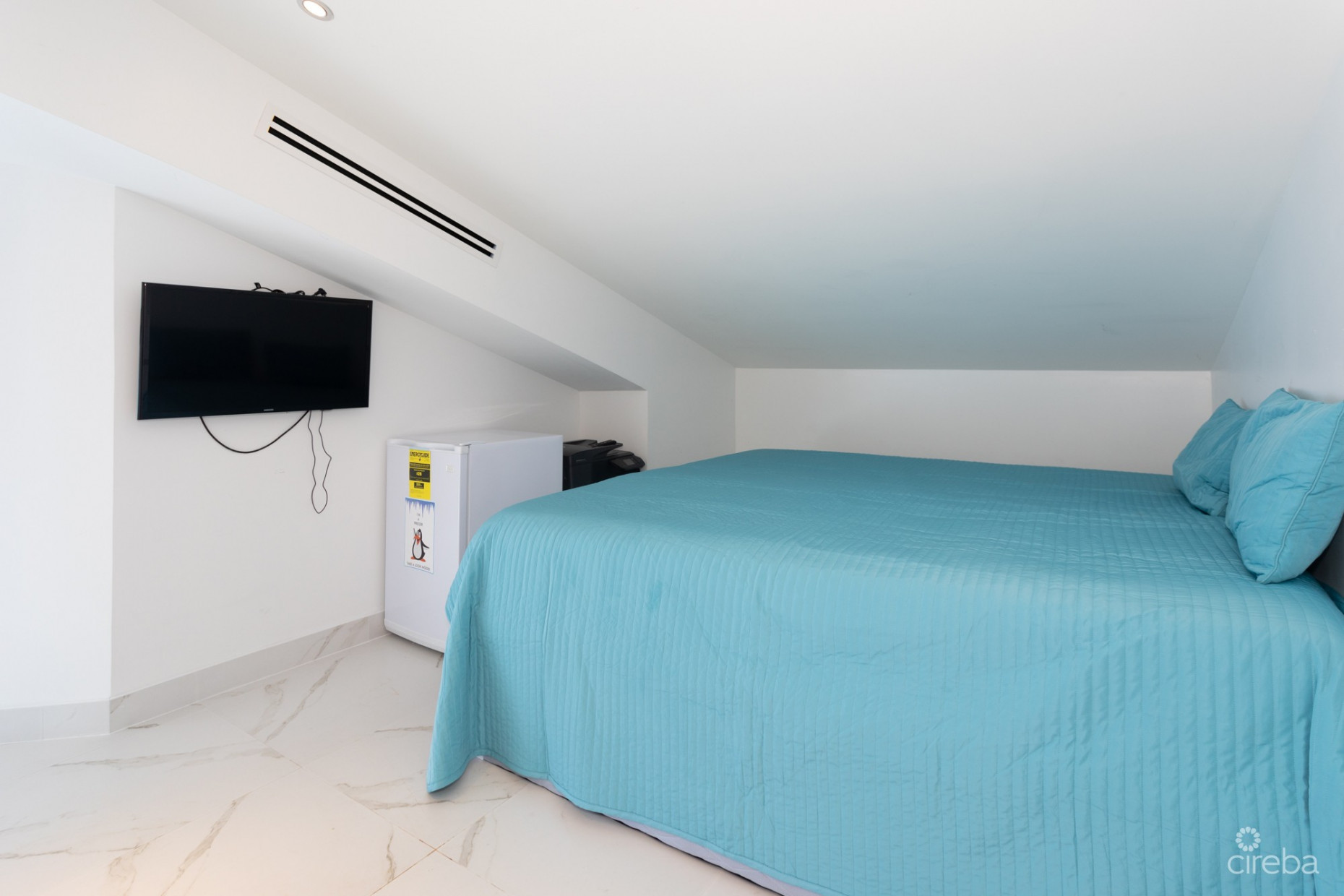 CAYMAN REEF RESORT BEACHFRONT WITH FUTURE REDEVELOPMENT