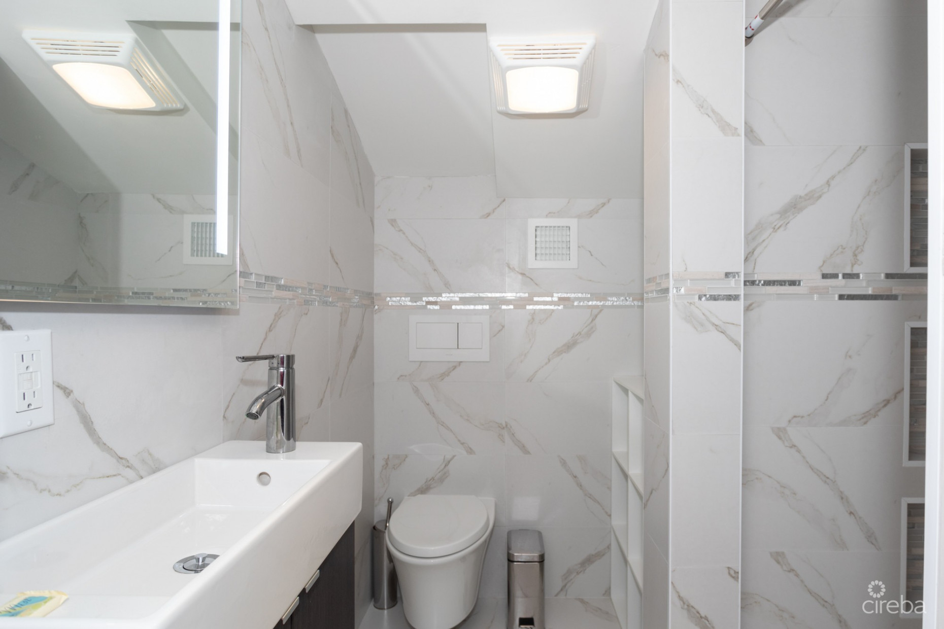 CAYMAN REEF RESORT BEACHFRONT WITH FUTURE REDEVELOPMENT