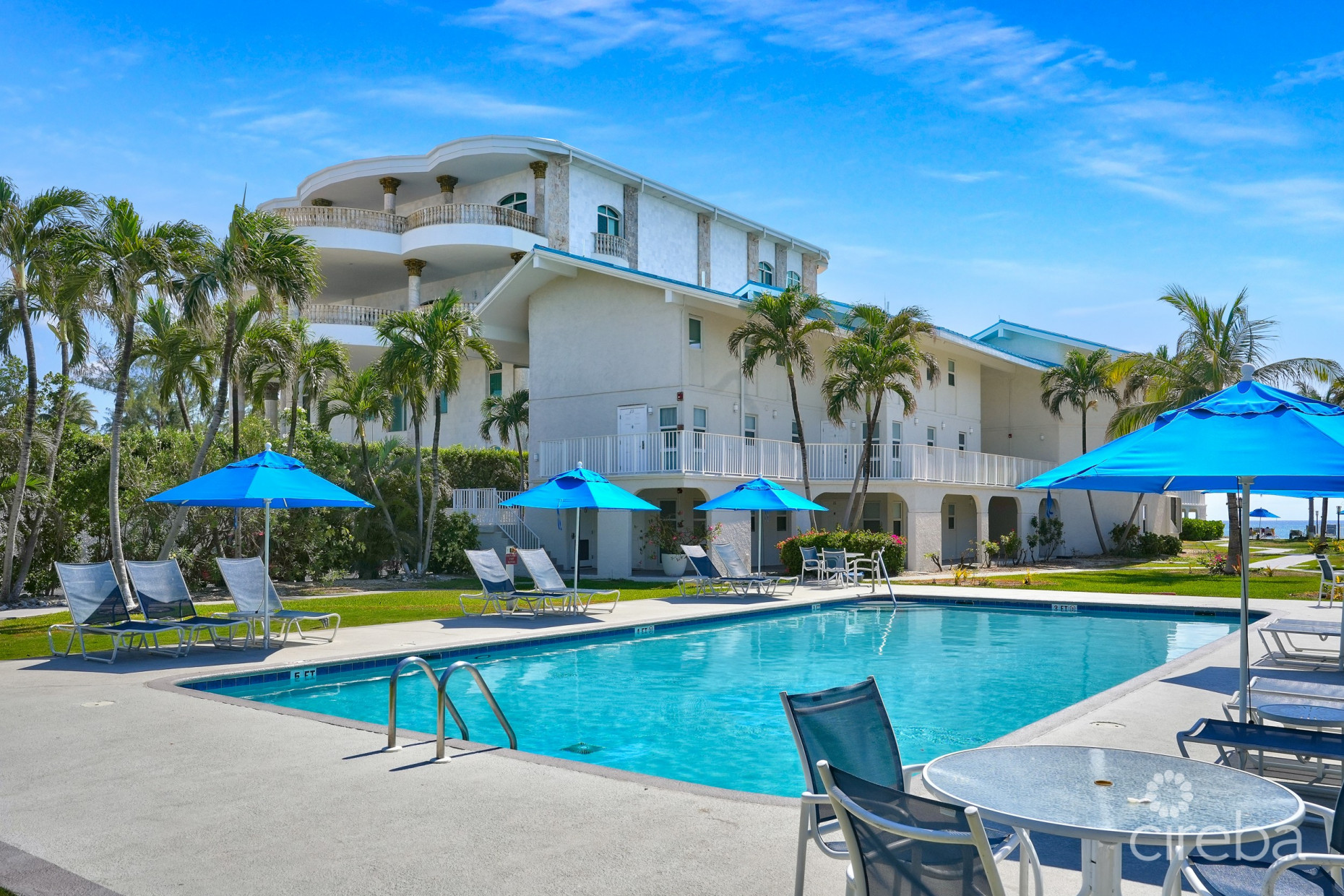 CAYMAN REEF RESORT BEACHFRONT WITH FUTURE REDEVELOPMENT