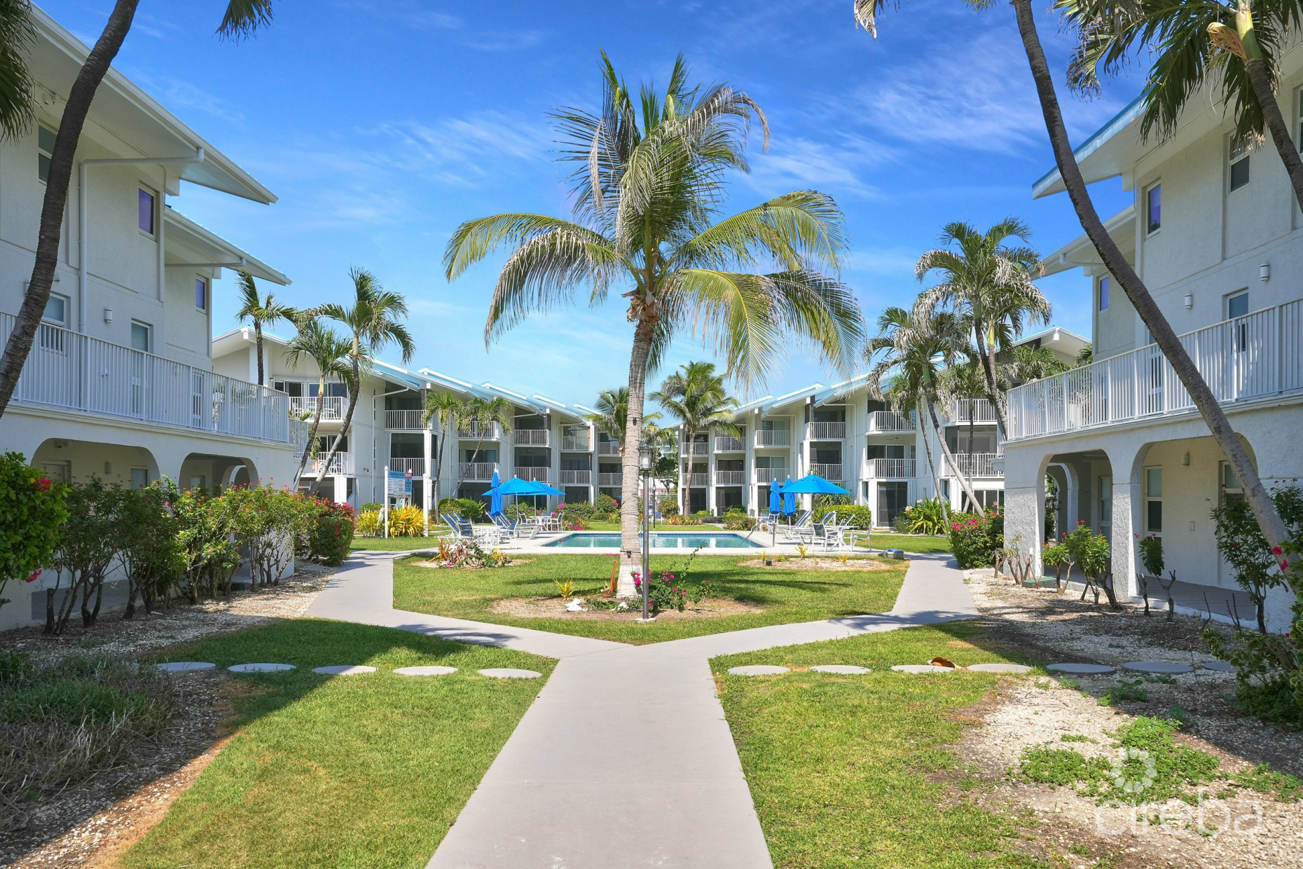 CAYMAN REEF RESORT BEACHFRONT WITH FUTURE REDEVELOPMENT