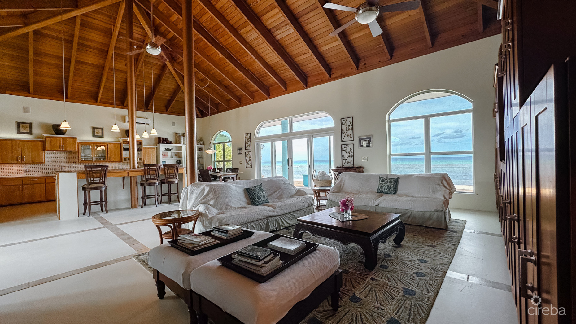 LITTLE CAYMAN BEACHFRONT HOME WITH 2 LOTS AND POOL