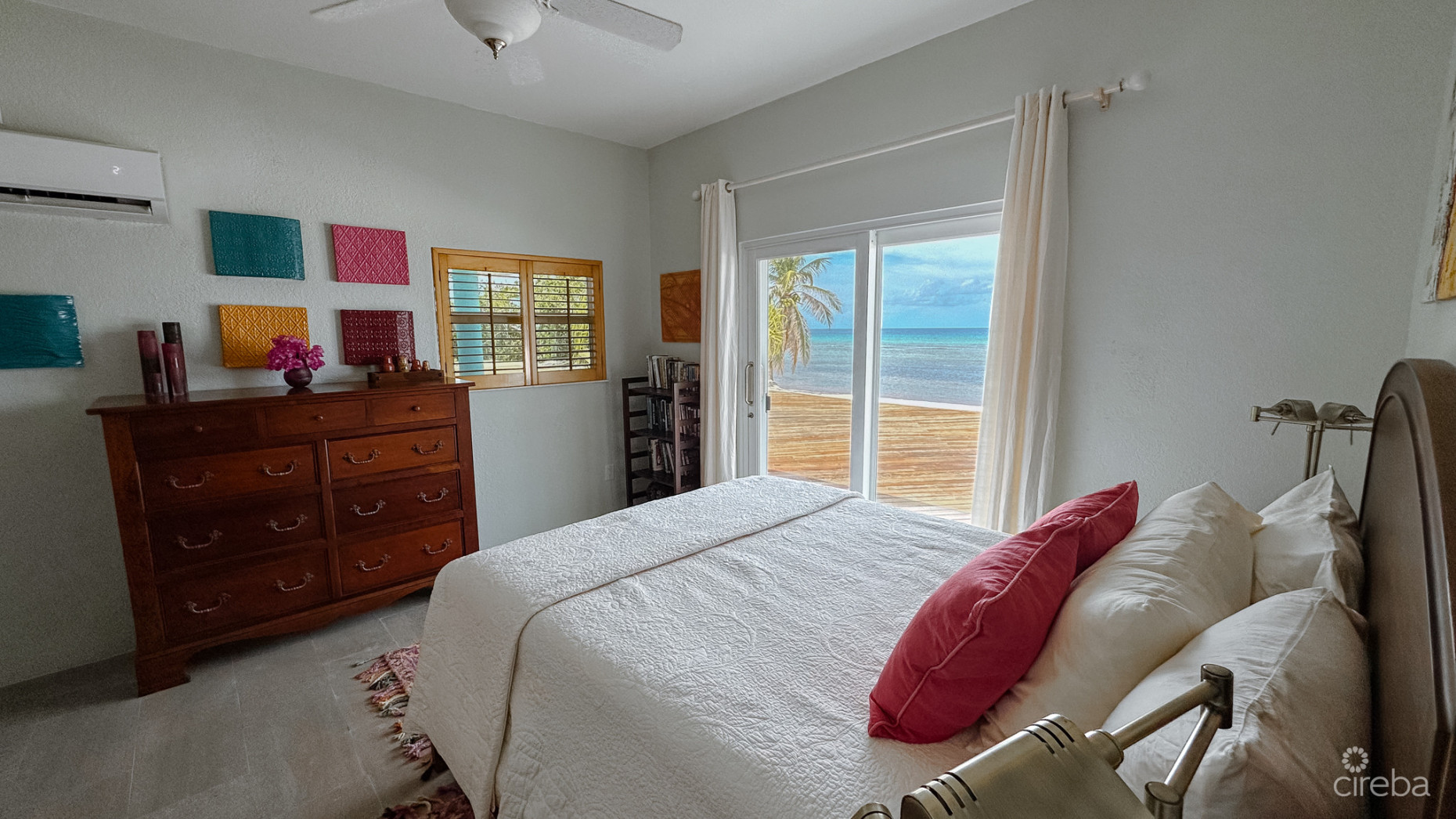 LITTLE CAYMAN BEACHFRONT HOME WITH 2 LOTS AND POOL