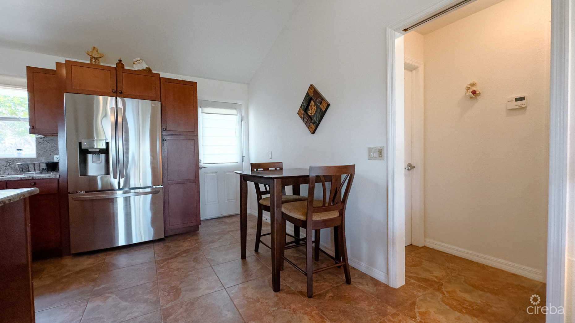 LITTLE CAYMAN OCEAN VIEW RESIDENTIAL HOME WITH BEACHFRONT LOT