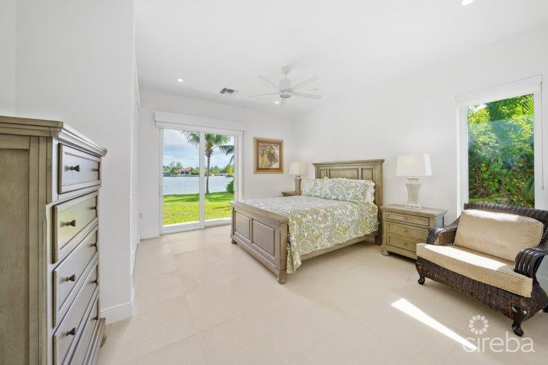 UNIQUE PATRICK'S ISLAND CANALFRONT W GUEST HOUSE | 3 CAR GARAGE