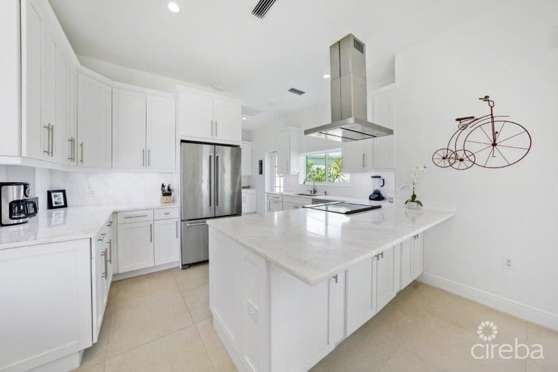 UNIQUE PATRICK'S ISLAND CANALFRONT W GUEST HOUSE | 3 CAR GARAGE