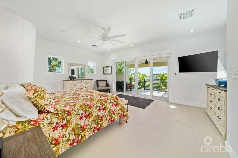 UNIQUE PATRICK'S ISLAND CANALFRONT W GUEST HOUSE | 3 CAR GARAGE