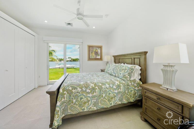 UNIQUE PATRICK'S ISLAND CANALFRONT W GUEST HOUSE | 3 CAR GARAGE