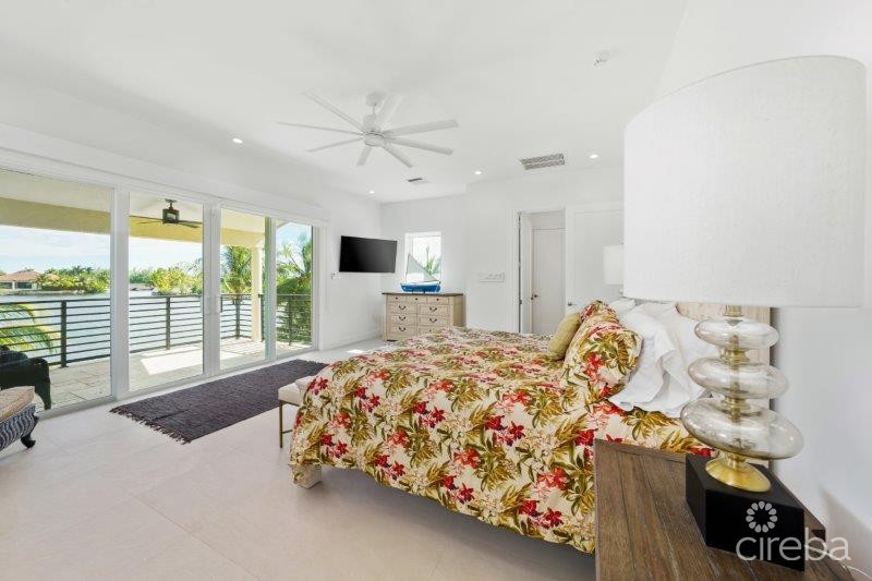 UNIQUE PATRICK'S ISLAND CANALFRONT W GUEST HOUSE | 3 CAR GARAGE