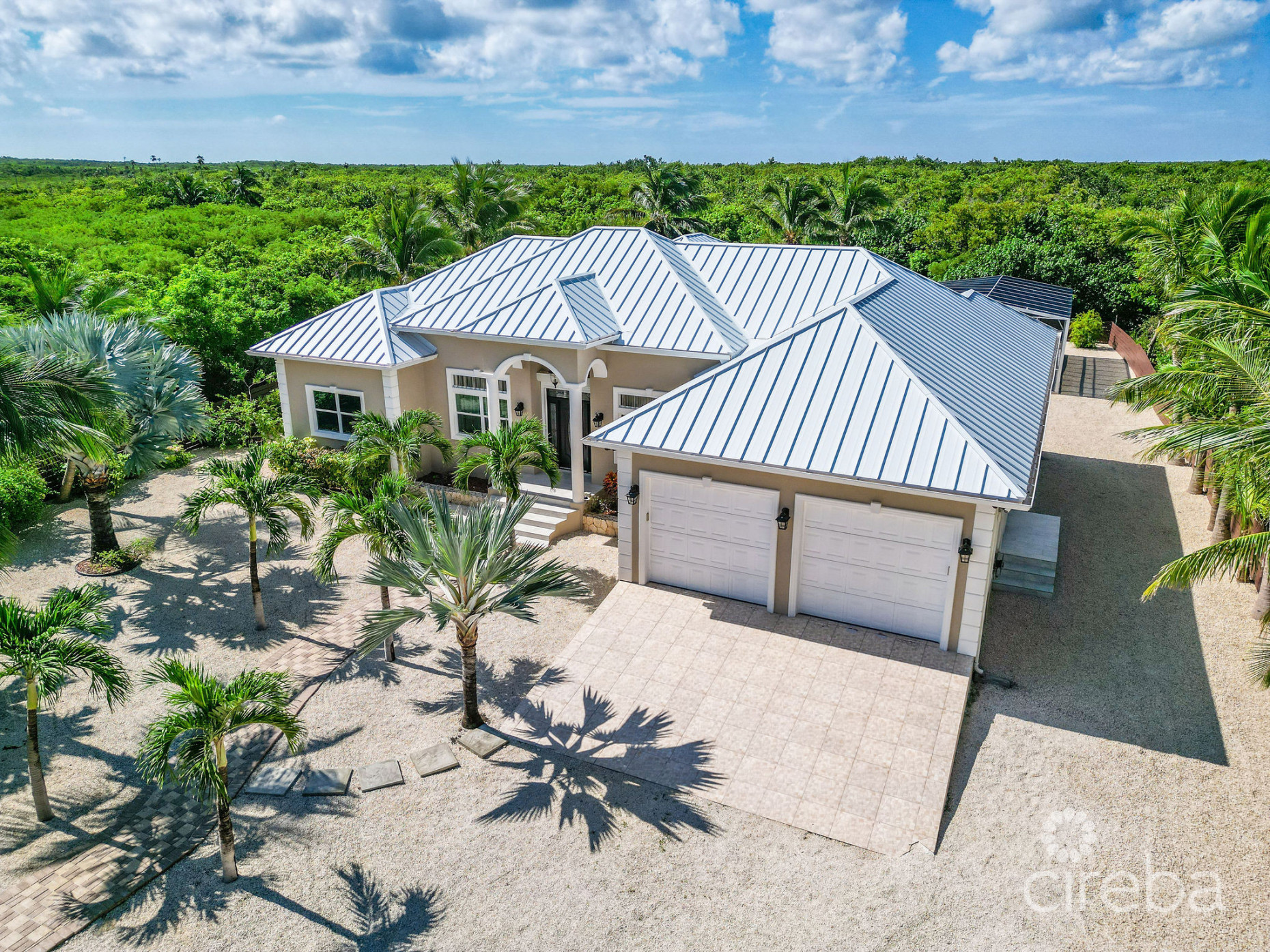 A CONTEMPORARY ISLAND ESCAPE ON RUM POINT DRIVE