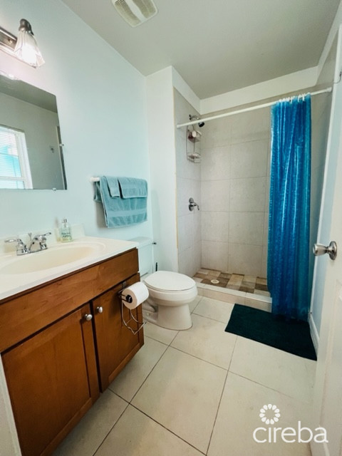 EAST END PARADISE VILLAS.  3 BED, 3 BATH + DEN WITH PRIVATE BEACH