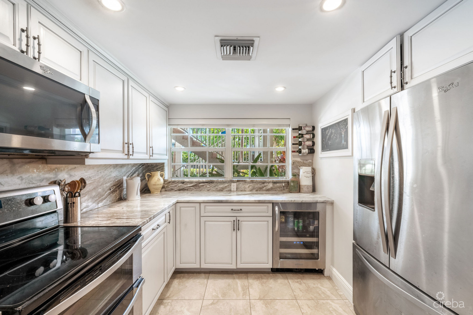 BRITANNIA LIONS COURT  UNIT #213 - RENOVATED 1-BEDROOM GARDEN VIEW CONDO