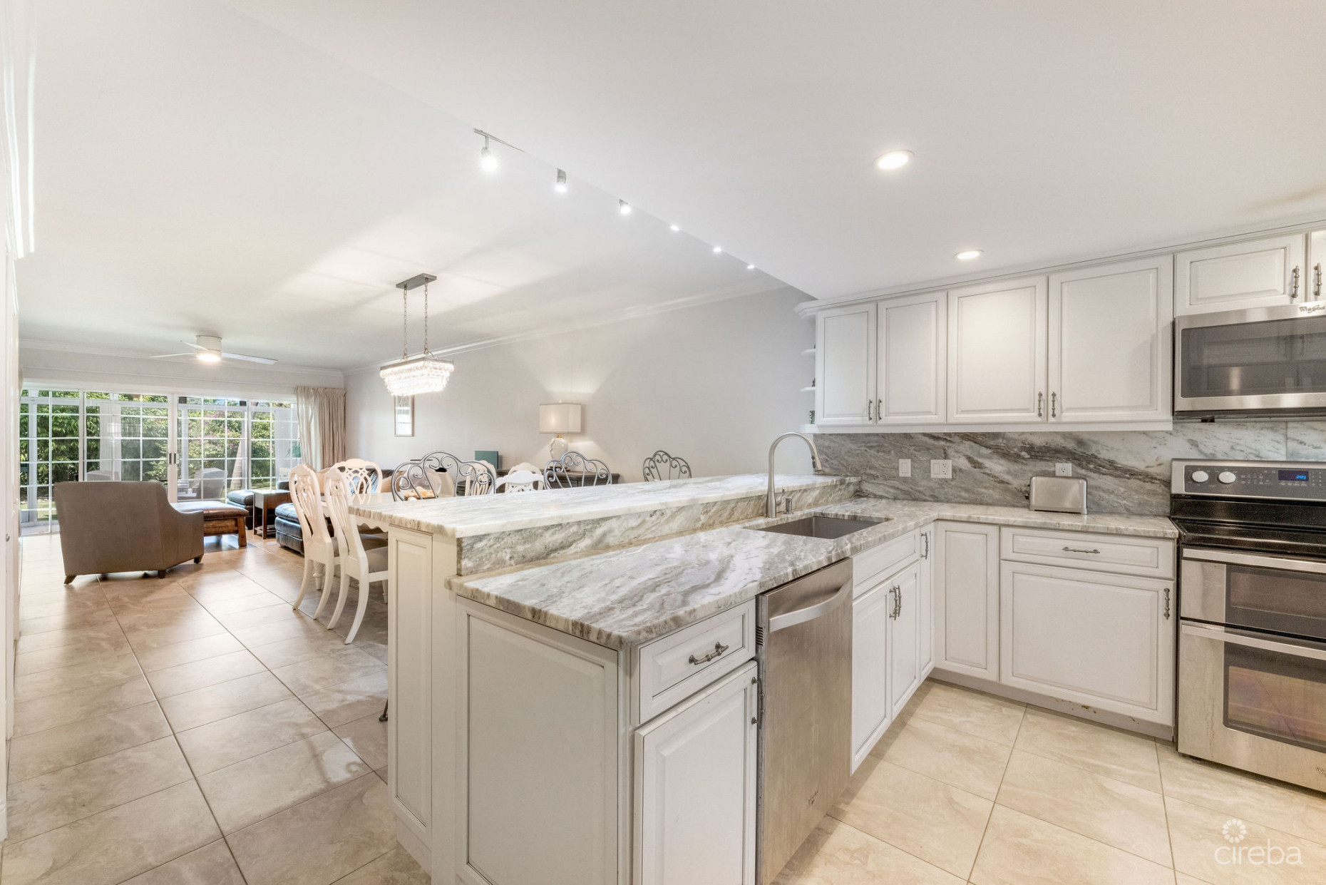 BRITANNIA LIONS COURT  UNIT #213 - RENOVATED 1-BEDROOM GARDEN VIEW CONDO