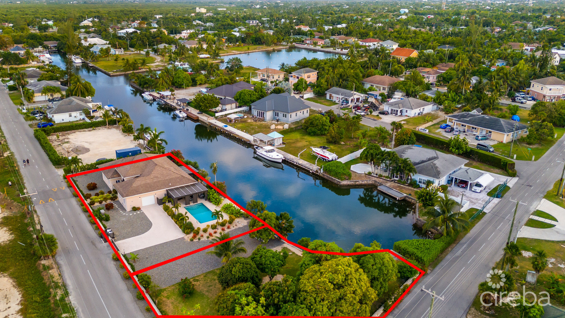 IMMACULATE 3BR FAMILY HOME W/ ADJACENT CANAL LOT