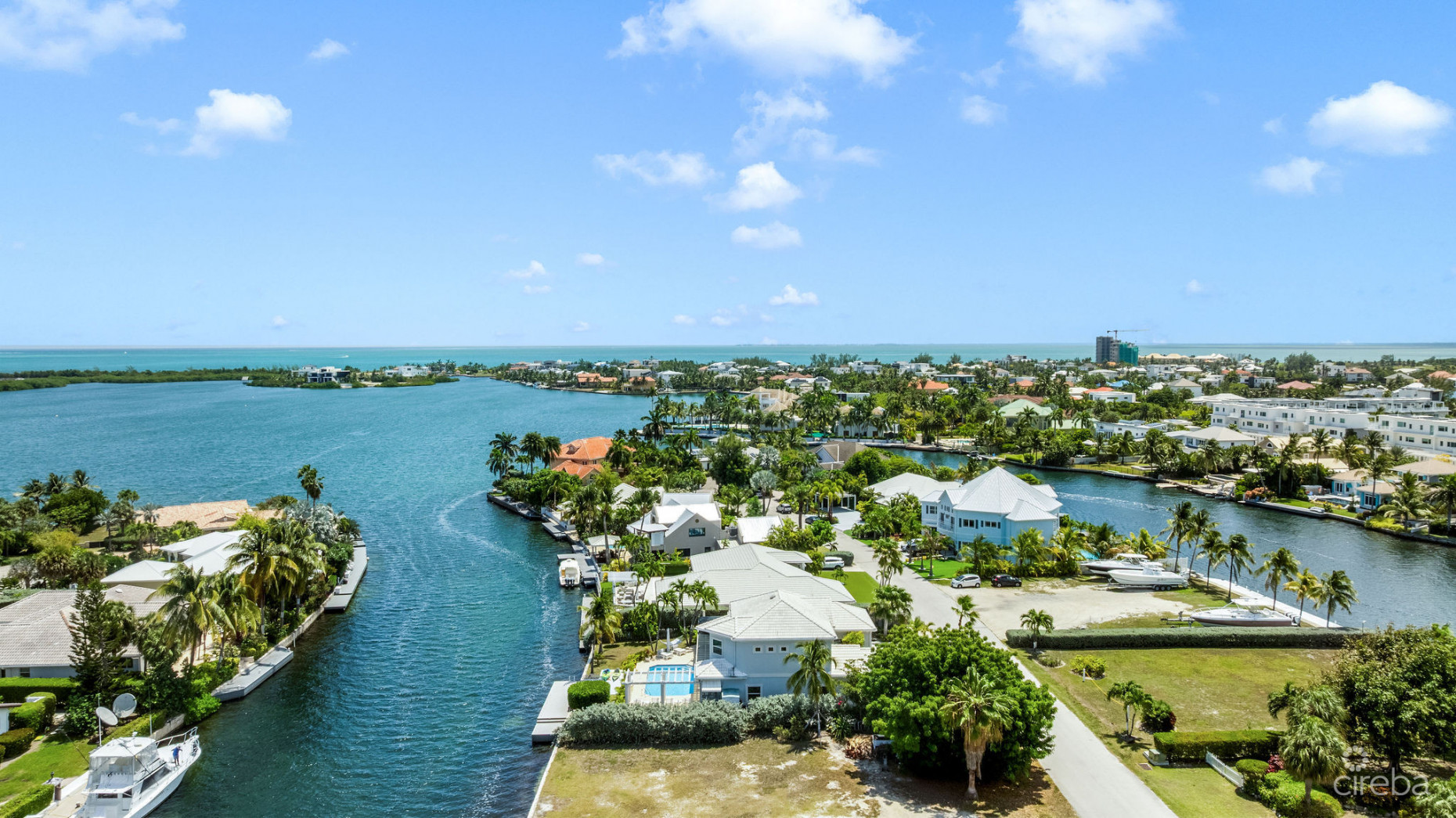 LATITUDE - CANAL FRONT LIVING IN GOVERNOR’S HARBOUR