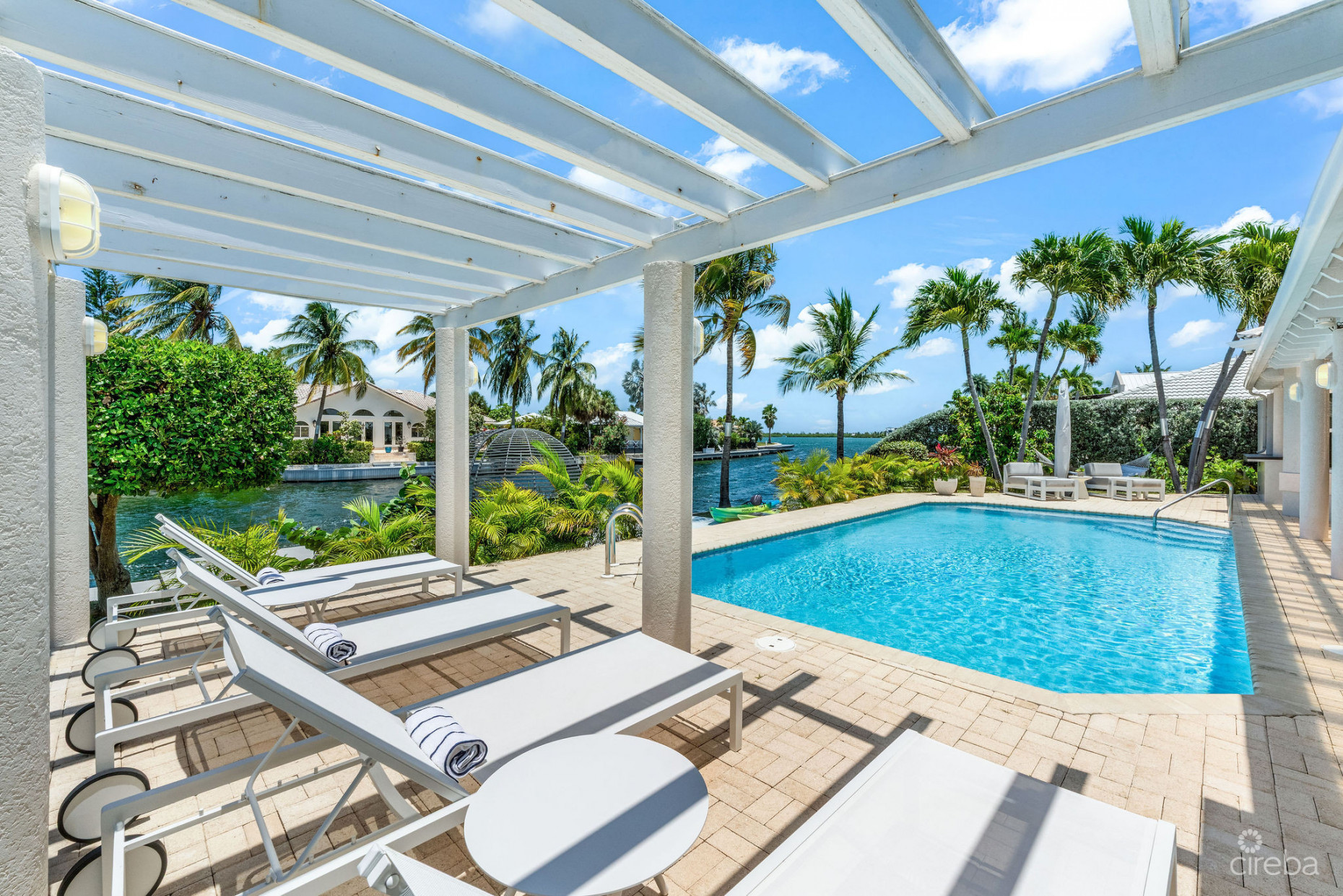 LATITUDE - CANAL FRONT LIVING IN GOVERNOR’S HARBOUR