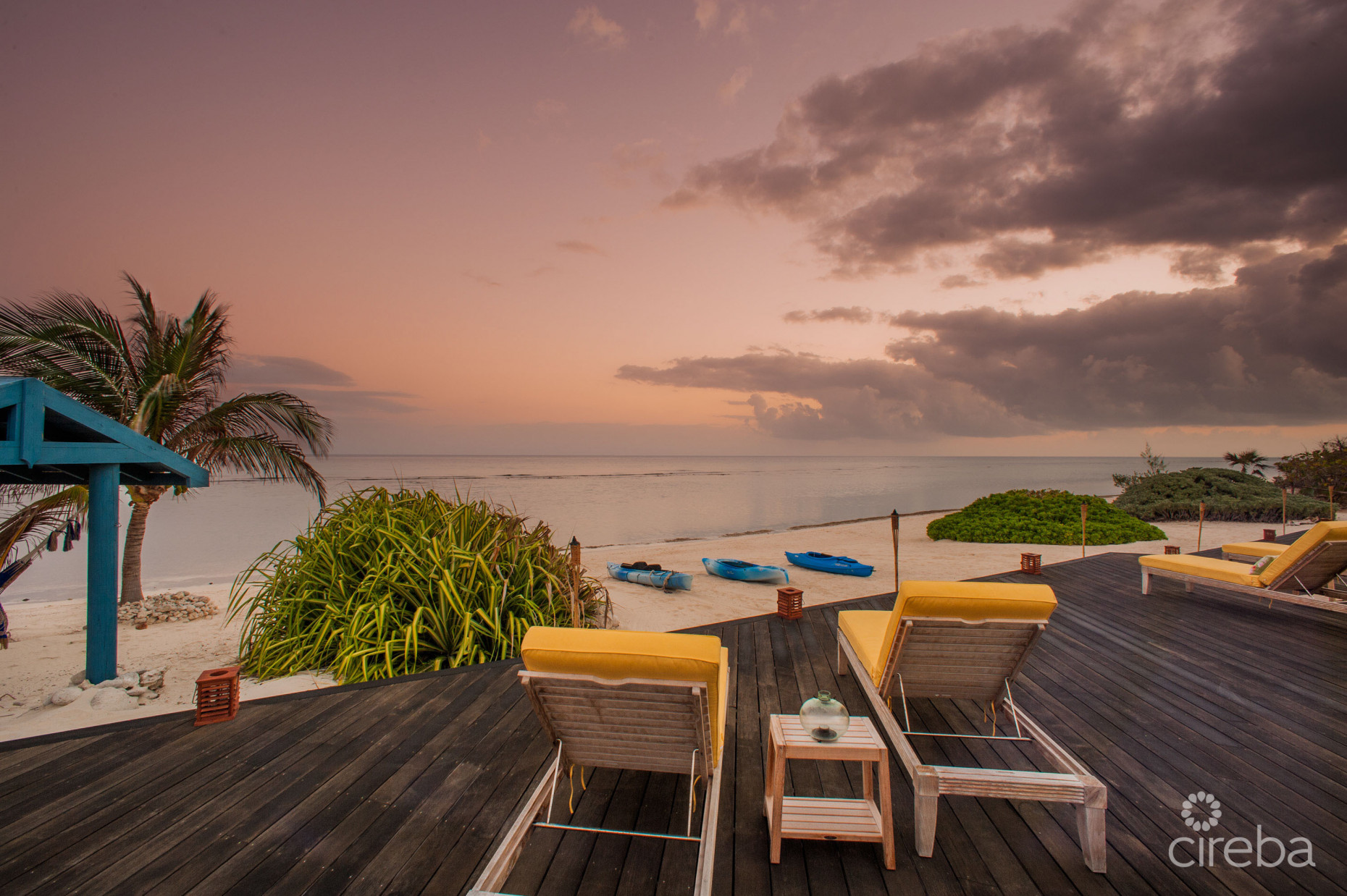 LITTLE CAYMAN BEACHFRONT HOME WITH 2 LOTS AND POOL