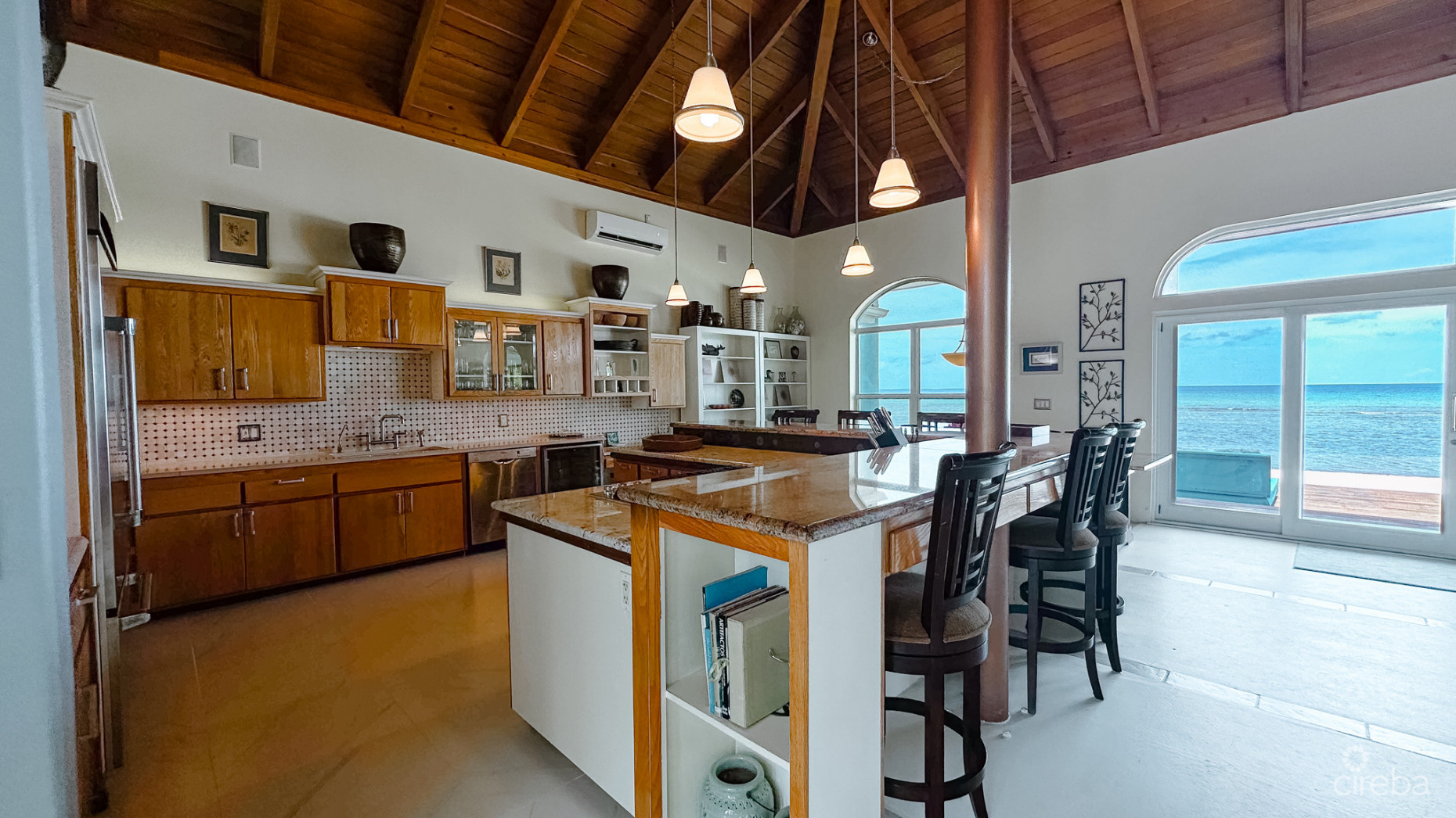 LITTLE CAYMAN BEACHFRONT HOME WITH 2 LOTS AND POOL