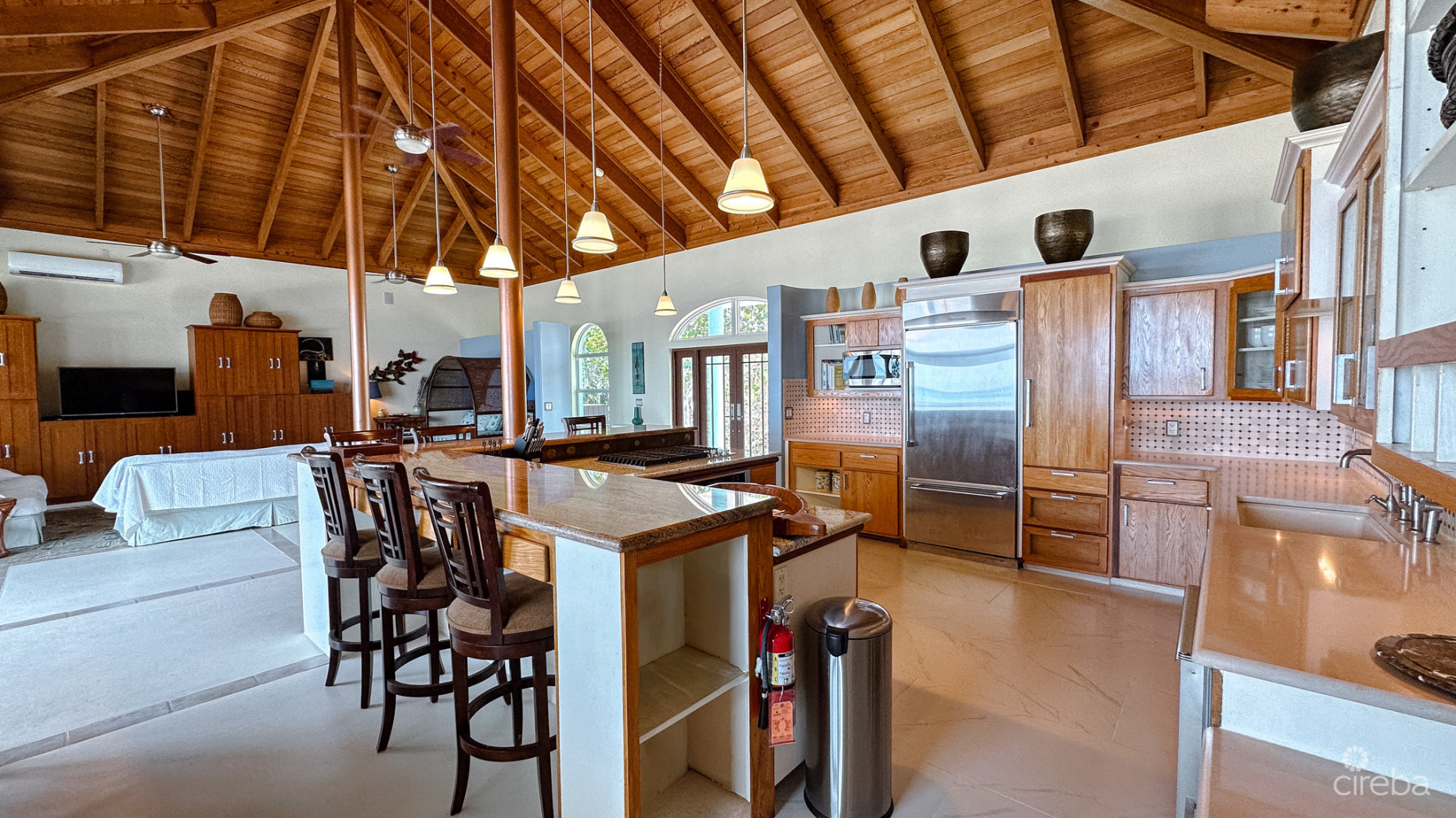 LITTLE CAYMAN BEACHFRONT HOME WITH 2 LOTS AND POOL