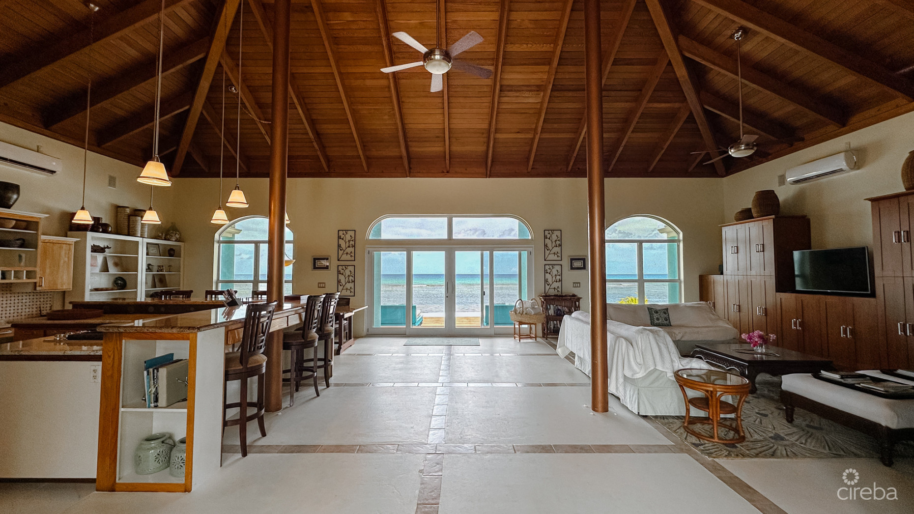 LITTLE CAYMAN BEACHFRONT HOME WITH 2 LOTS AND POOL