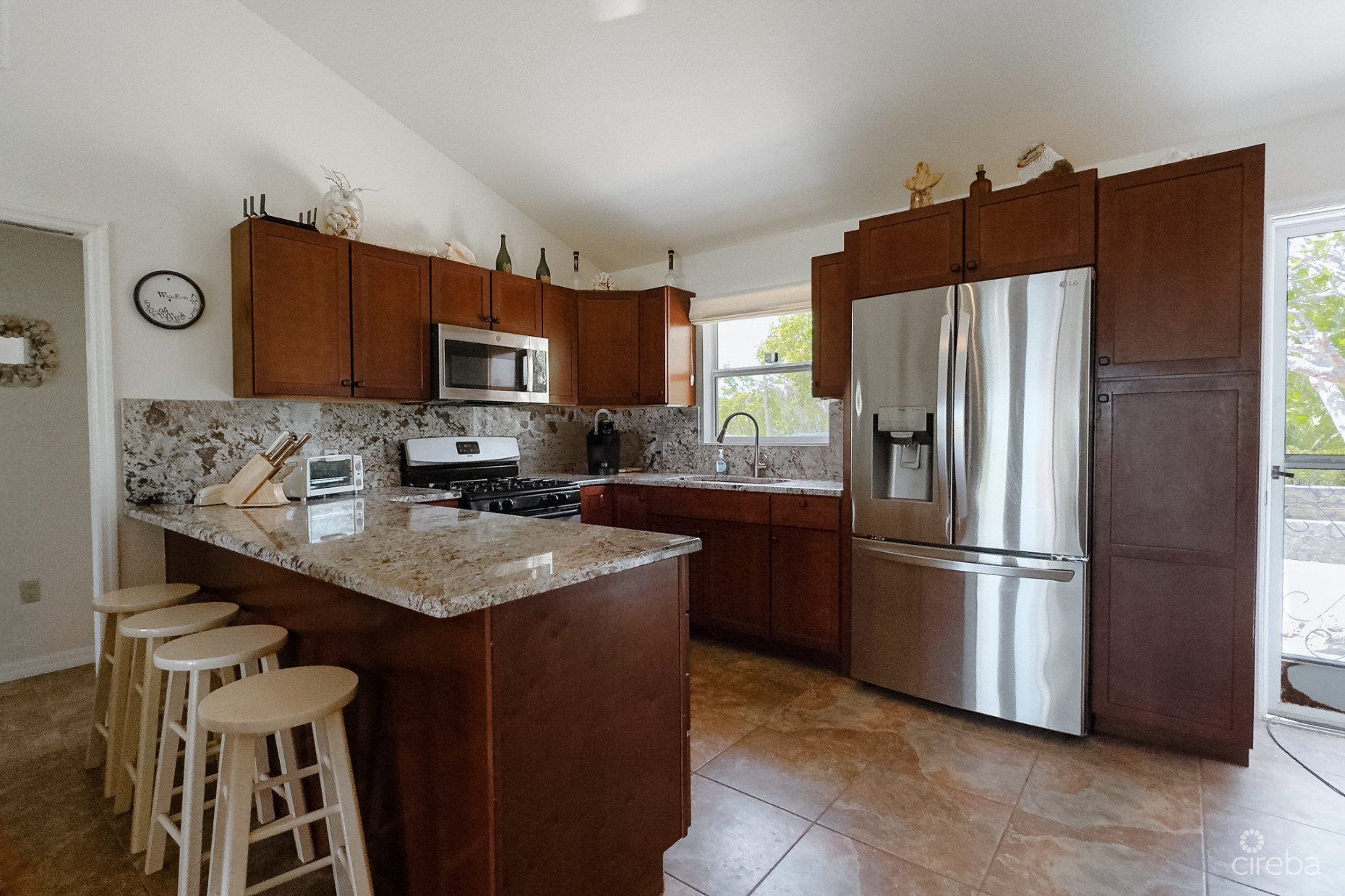 LITTLE CAYMAN OCEAN VIEW RESIDENTIAL HOME WITH BEACHFRONT LOT