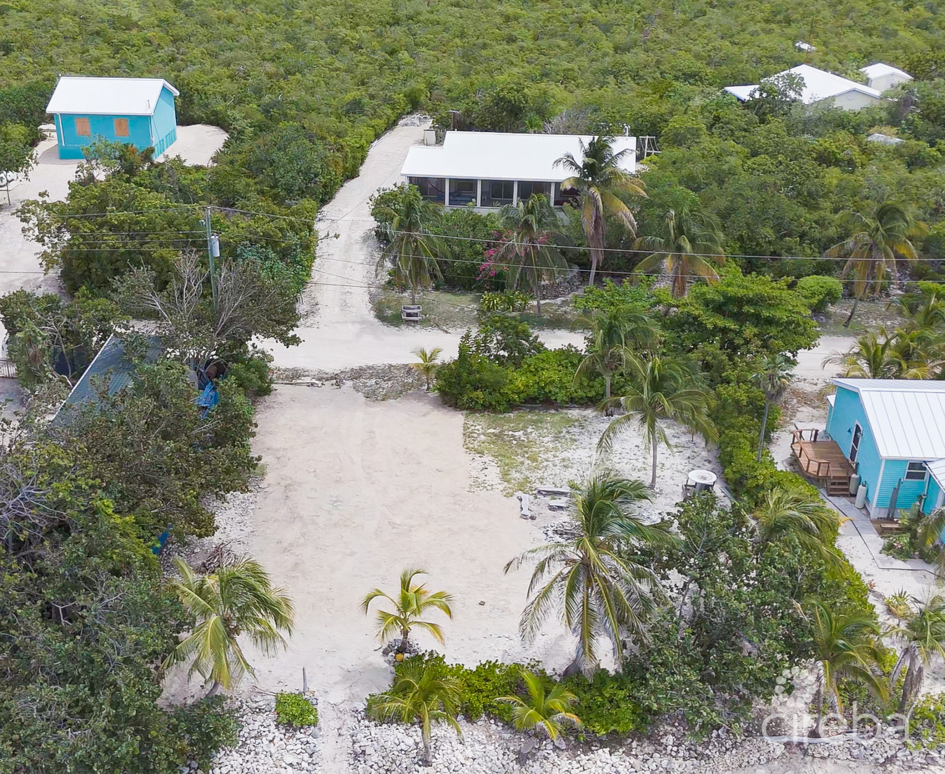 LITTLE CAYMAN OCEAN VIEW RESIDENTIAL HOME WITH BEACHFRONT LOT