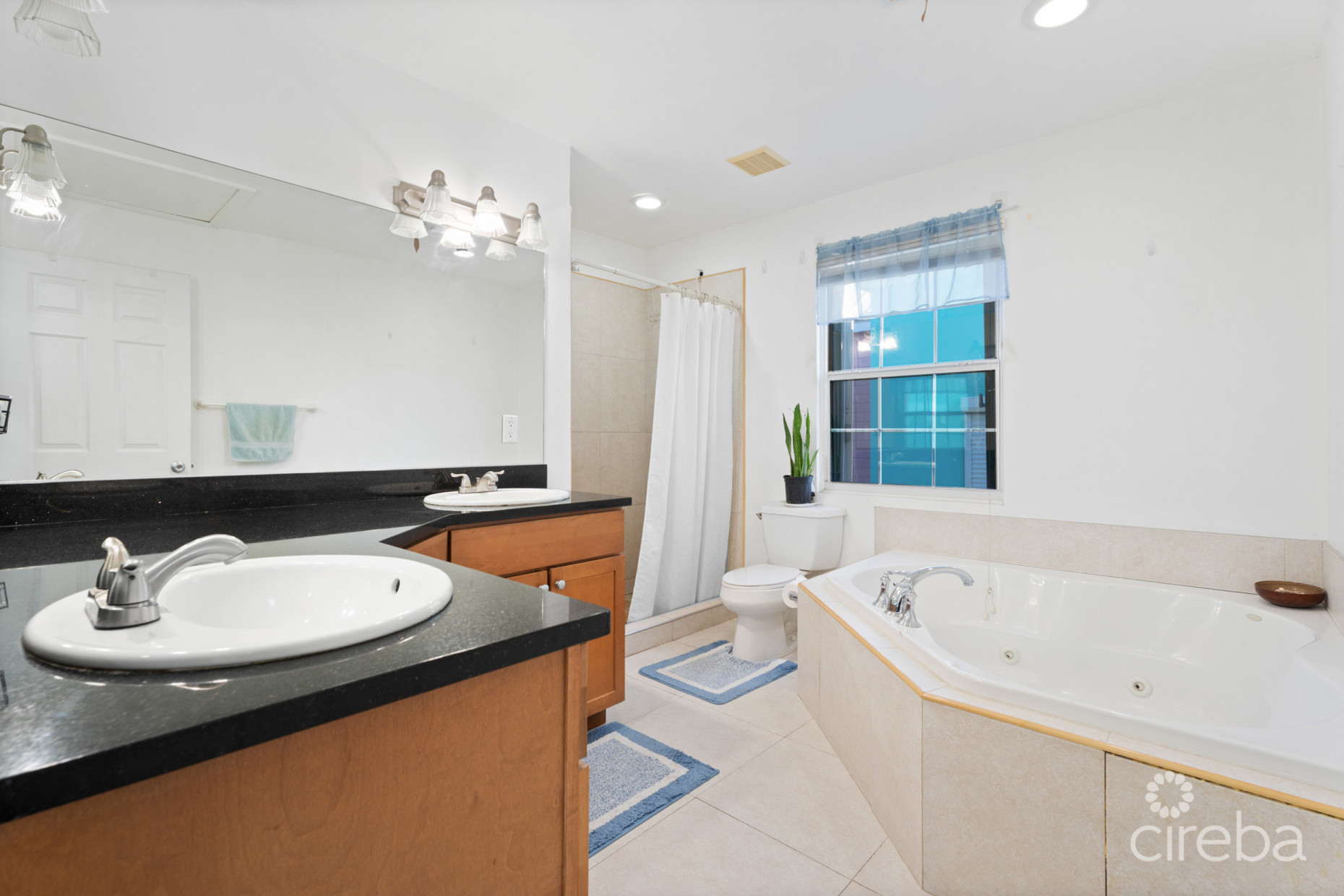 EAST END PARADISE VILLAS.  3 BED, 3 BATH + DEN WITH PRIVATE BEACH