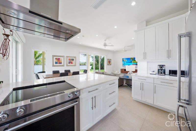 UNIQUE PATRICK'S ISLAND CANALFRONT W GUEST HOUSE | 3 CAR GARAGE