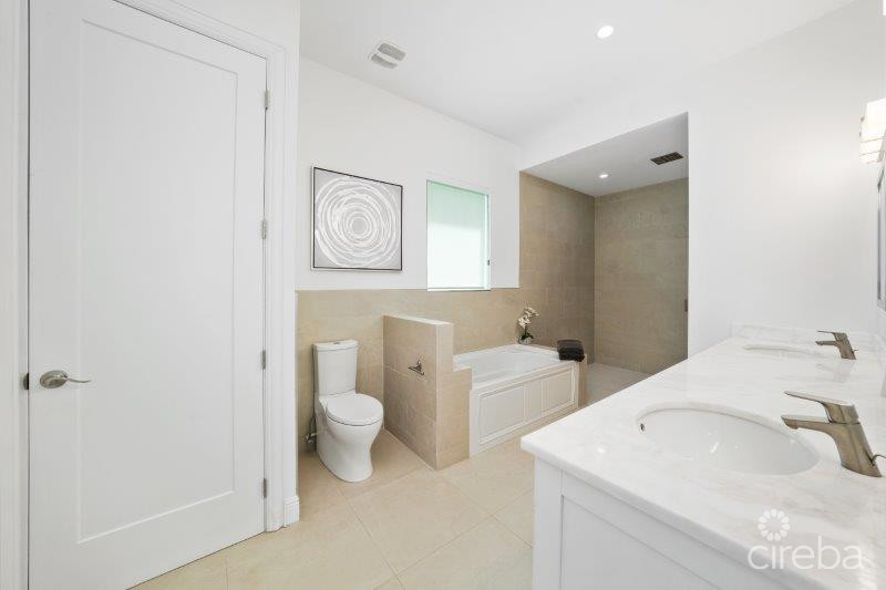 UNIQUE PATRICK'S ISLAND CANALFRONT W GUEST HOUSE | 3 CAR GARAGE