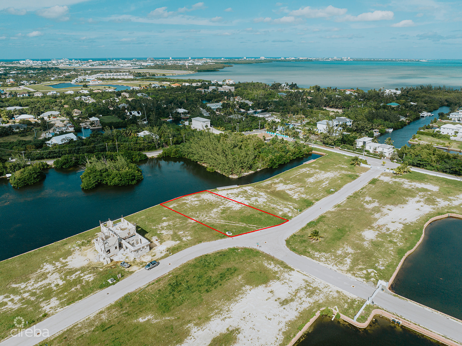 LARGEST LOT IN MUSTIQUE COVE - 0.31 ACRE CANAL LOT