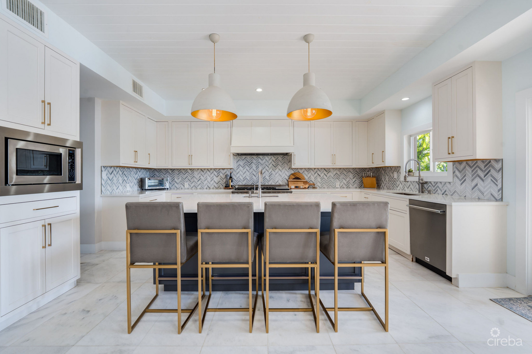 FULLY RENOVATED 4-BED CANAL FRONT HOME WITH DEN & DOCK | THE SHORES