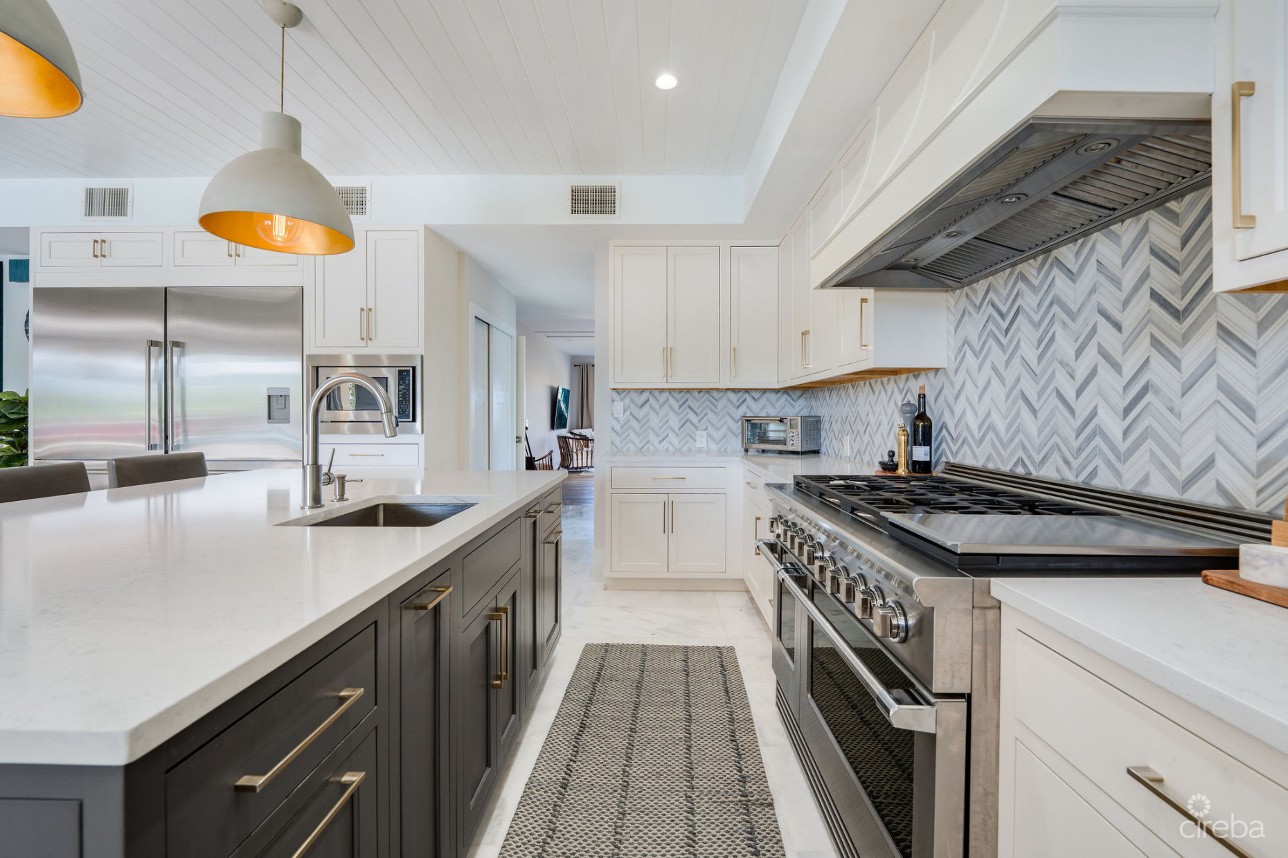 FULLY RENOVATED 4-BED CANAL FRONT HOME WITH DEN & DOCK | THE SHORES