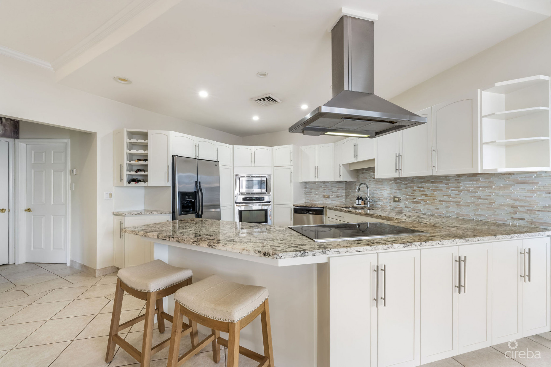 POINSETTIA PENTHOUSE B7, SEVEN MILE CORRIDOR