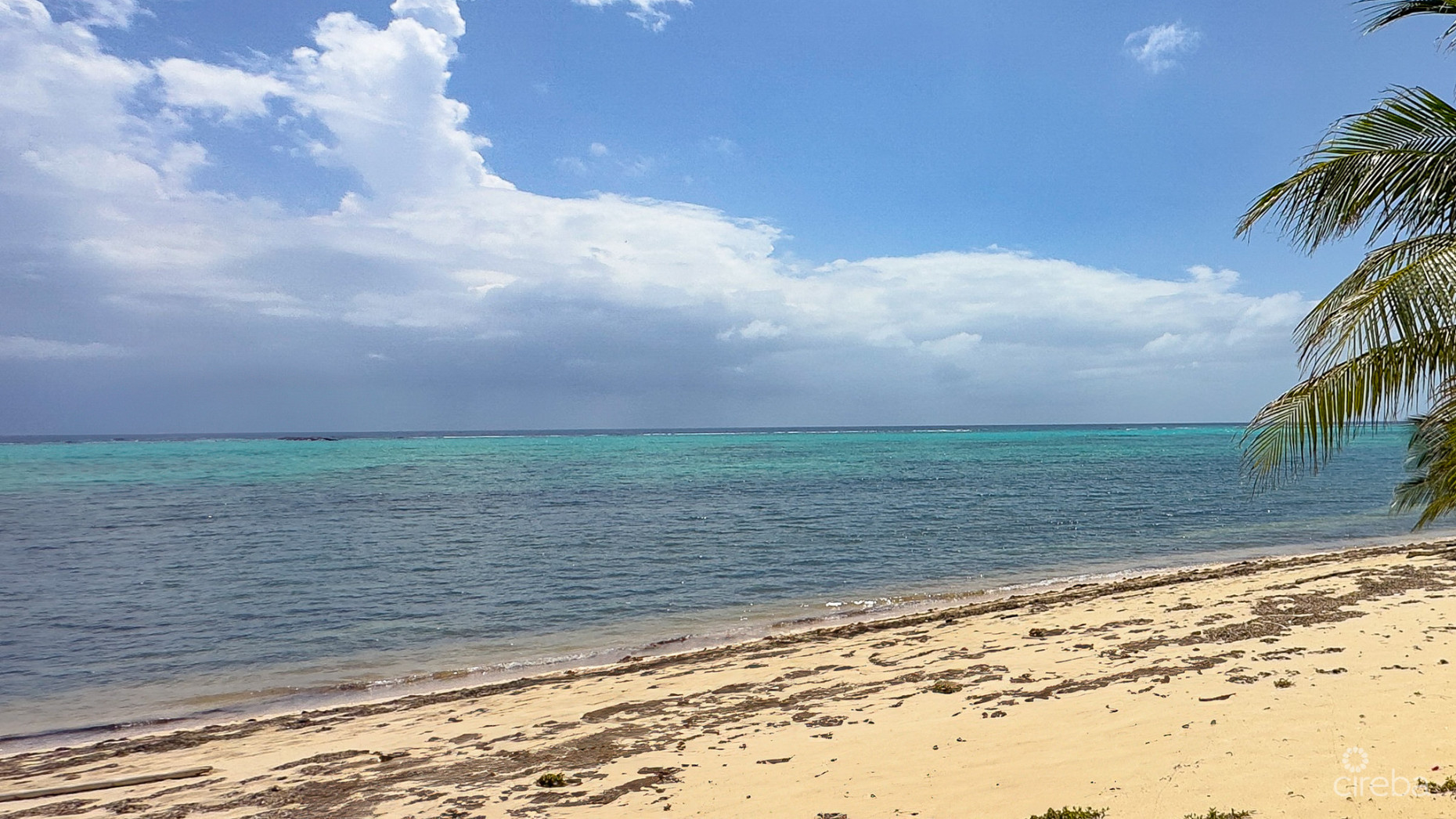 LITTLE CAYMAN LAND WITH BEACHFRONT COTTAGE