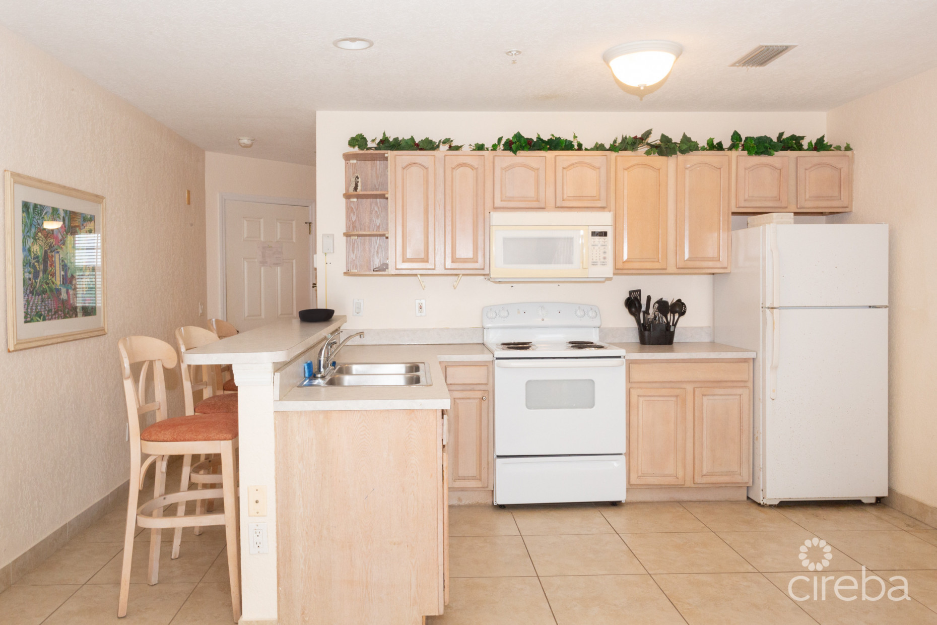 CARIB SANDS, BEACHFRONT LIVING CAYMAN BRAC