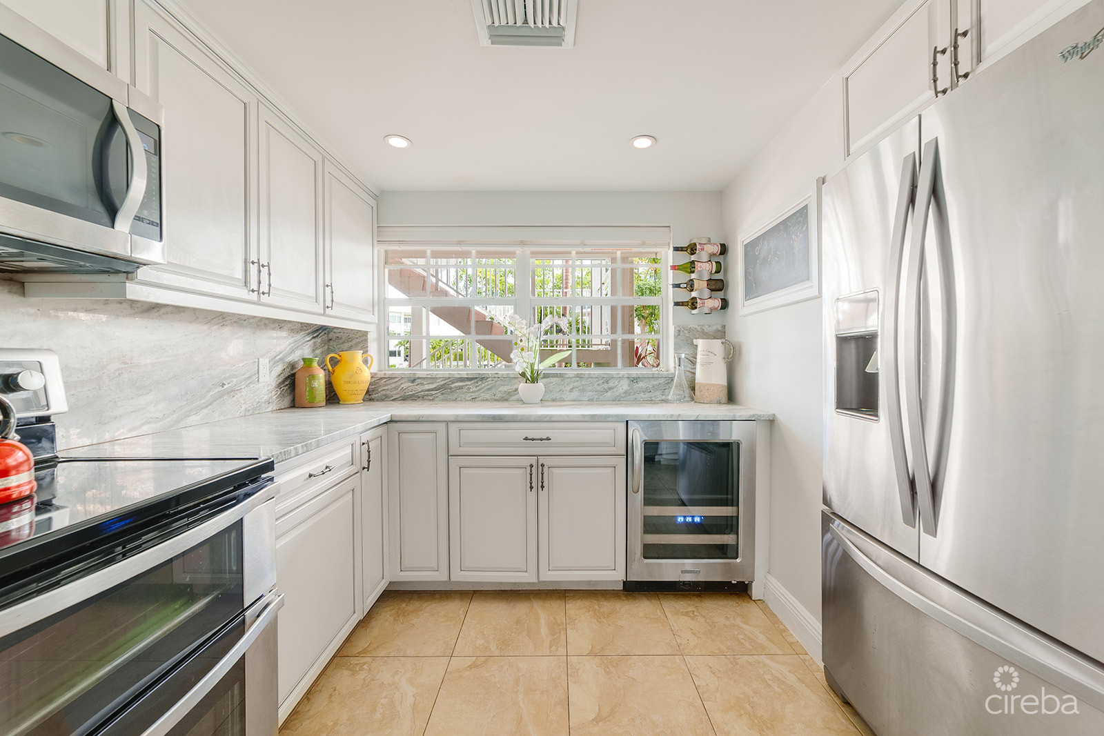 BRITANNIA LIONS COURT  UNIT #213 - 1-BEDROOM GARDEN VIEW CONDO