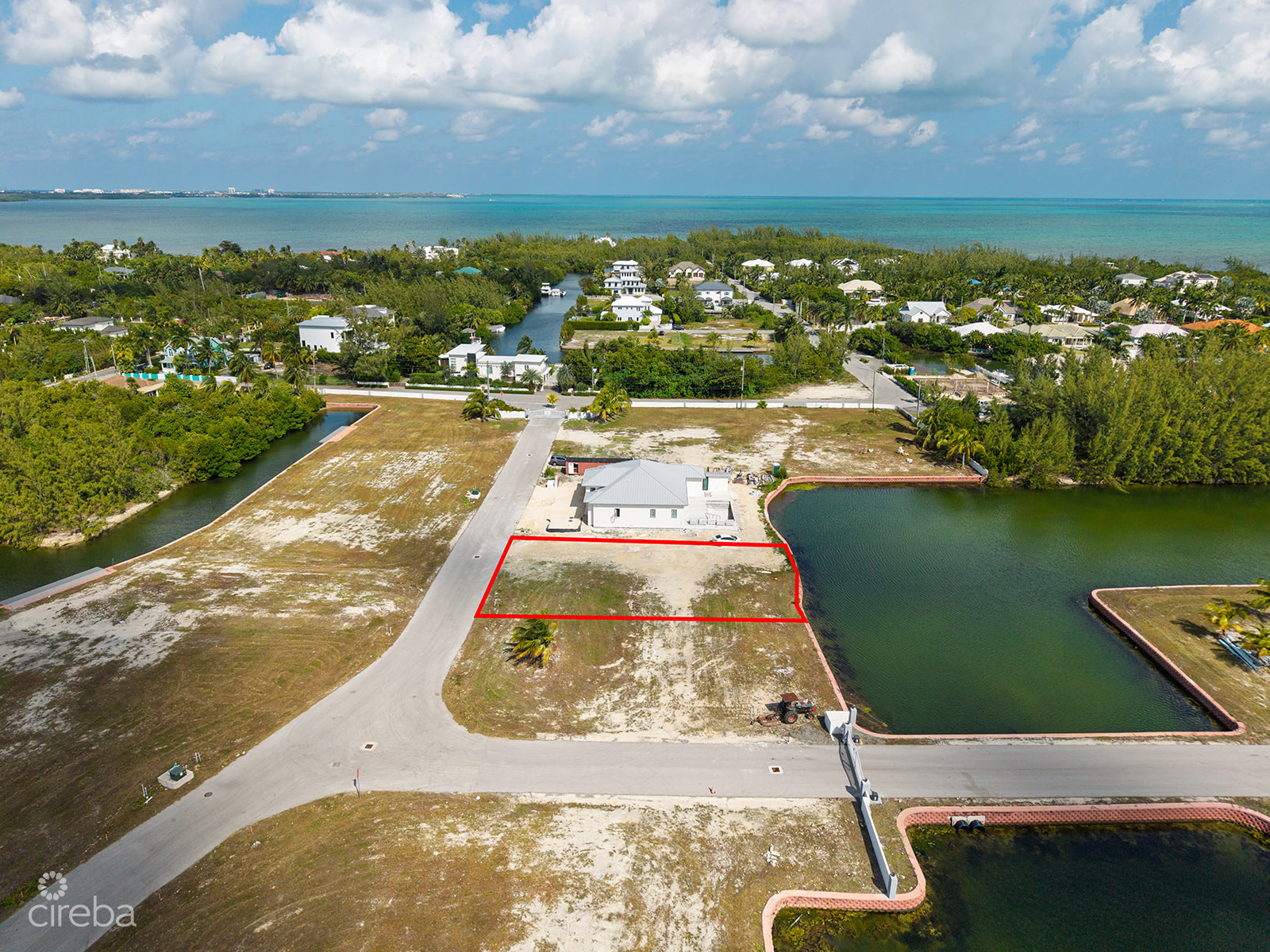 0.24 ACRE CANAL LOT IN GATED COMMUNITY - MUSTIQUE COVE