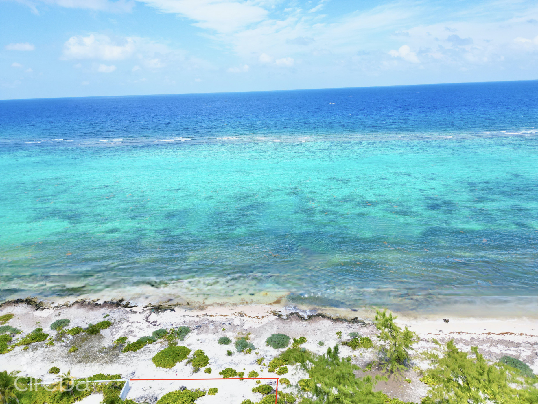 RUM POINT BEACHFRONT LOT WITH CORAL REEF
