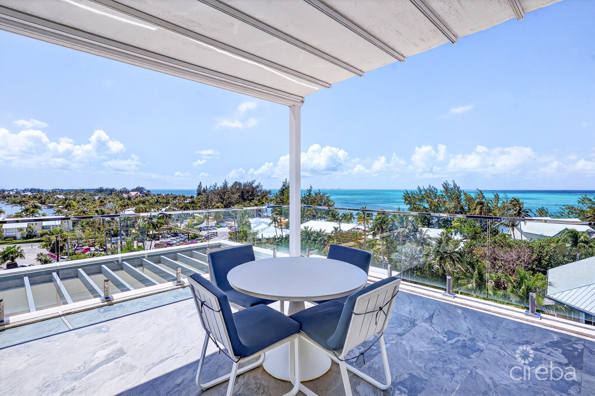 RUM POINT RESORT | RESIDENCE 203 BEACHFRONT CONDO