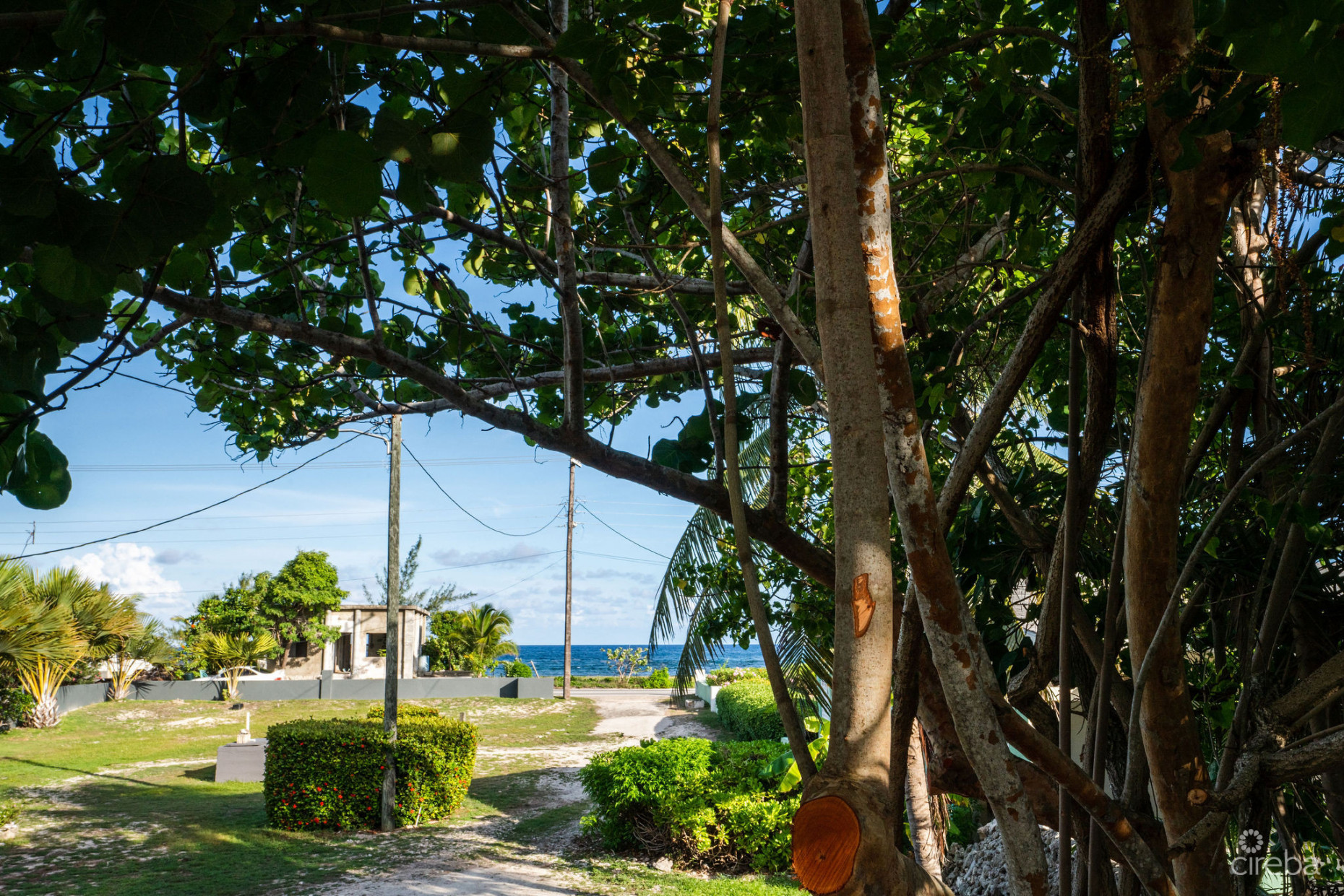 CHARMING OCEANVIEW COTTAGE ACROSS FROM THE SEA ON EXPANSIVE 0.89 ACRE LOT