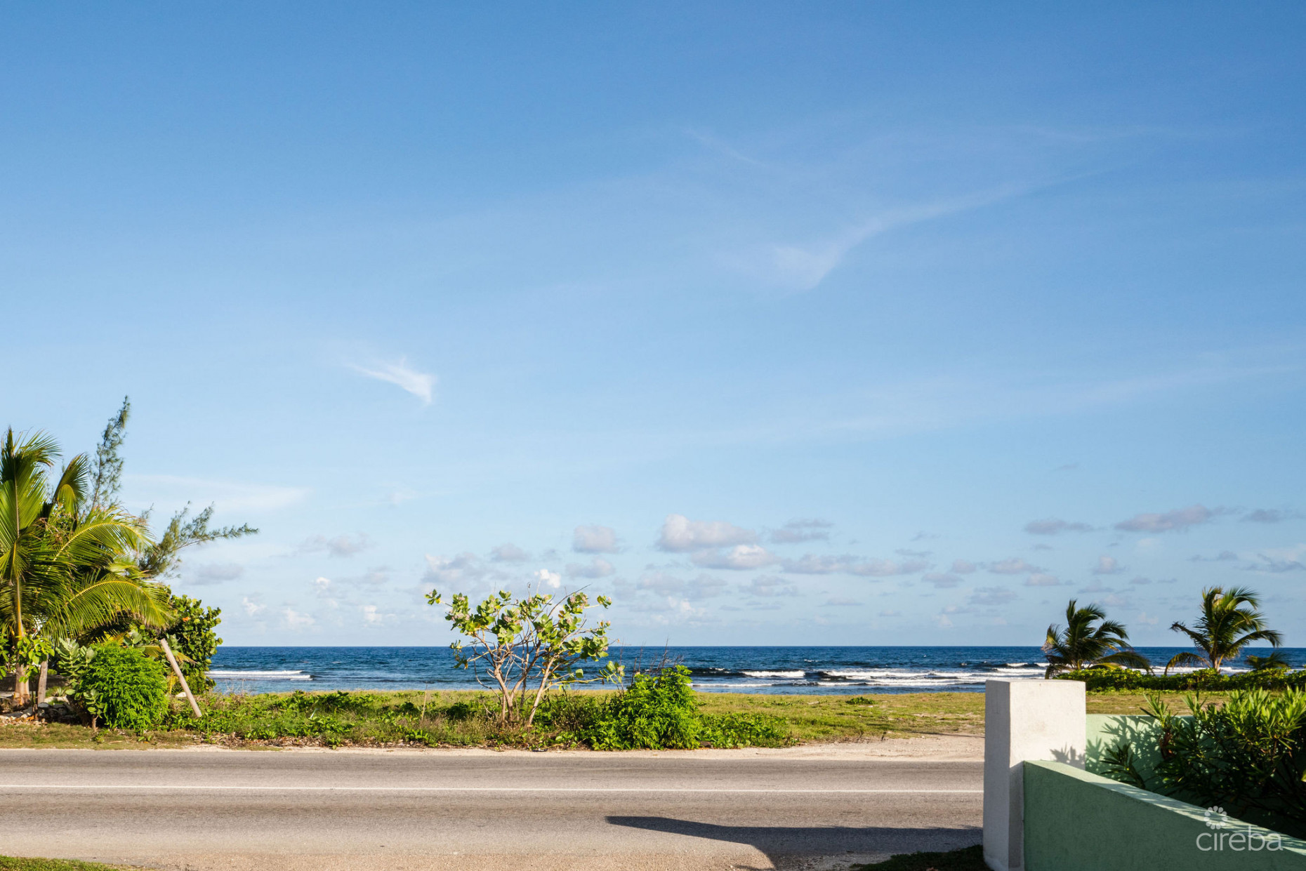 CHARMING OCEANVIEW COTTAGE ACROSS FROM THE SEA ON EXPANSIVE 0.89 ACRE LOT