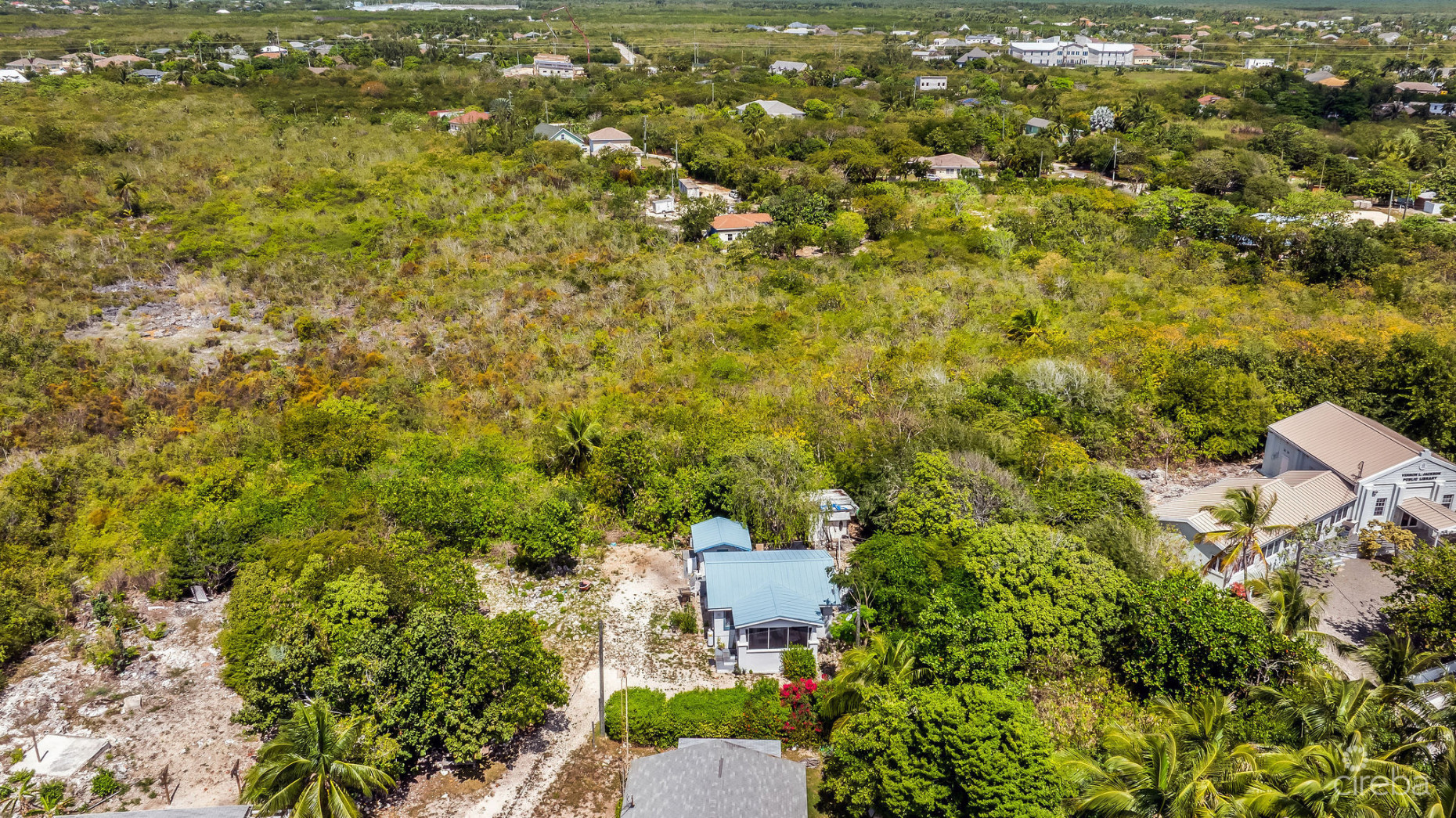 CHARMING OCEANVIEW COTTAGE ACROSS FROM THE SEA ON EXPANSIVE 0.89 ACRE LOT
