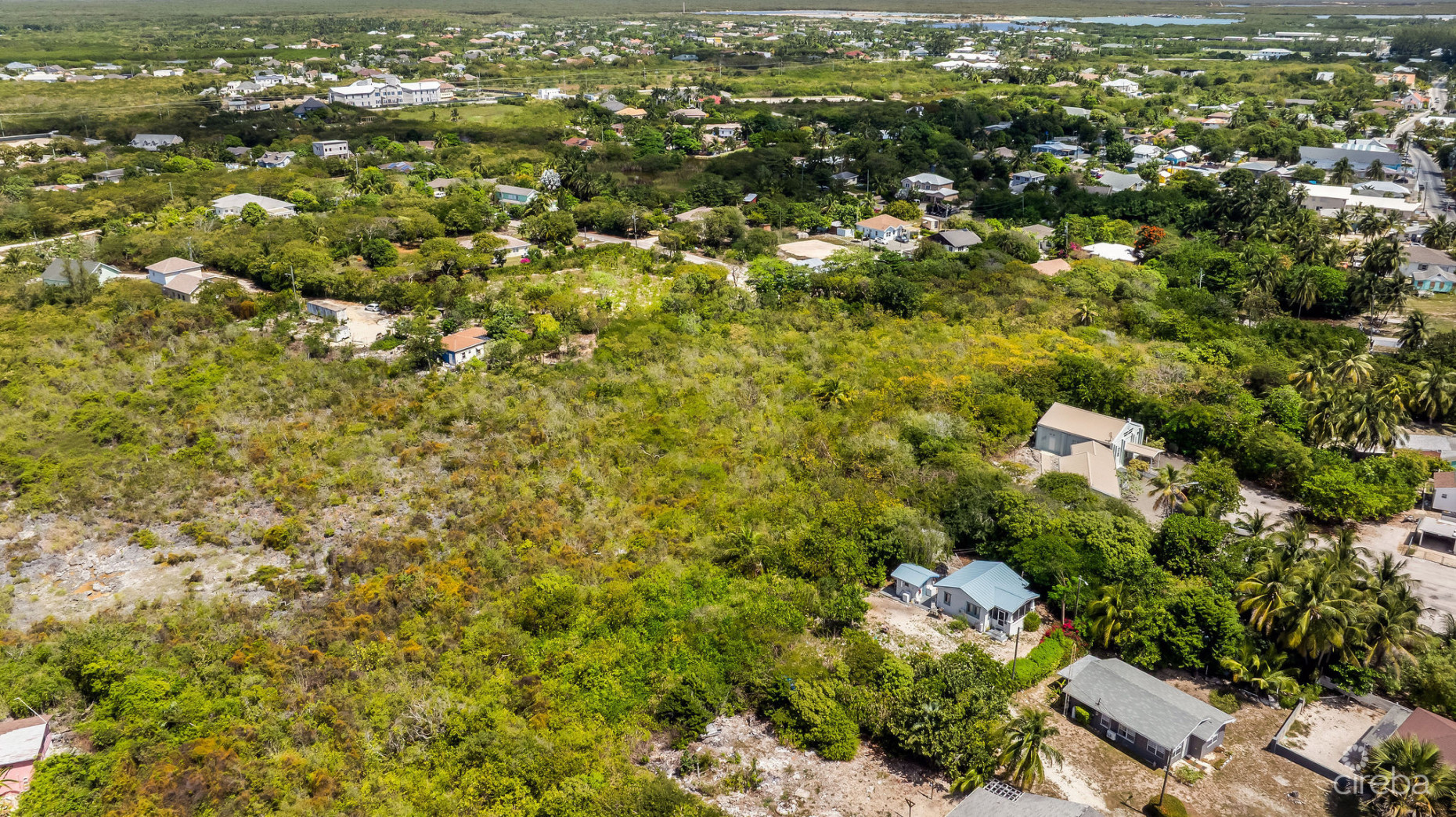 CHARMING OCEANVIEW COTTAGE ACROSS FROM THE SEA ON EXPANSIVE 0.89 ACRE LOT