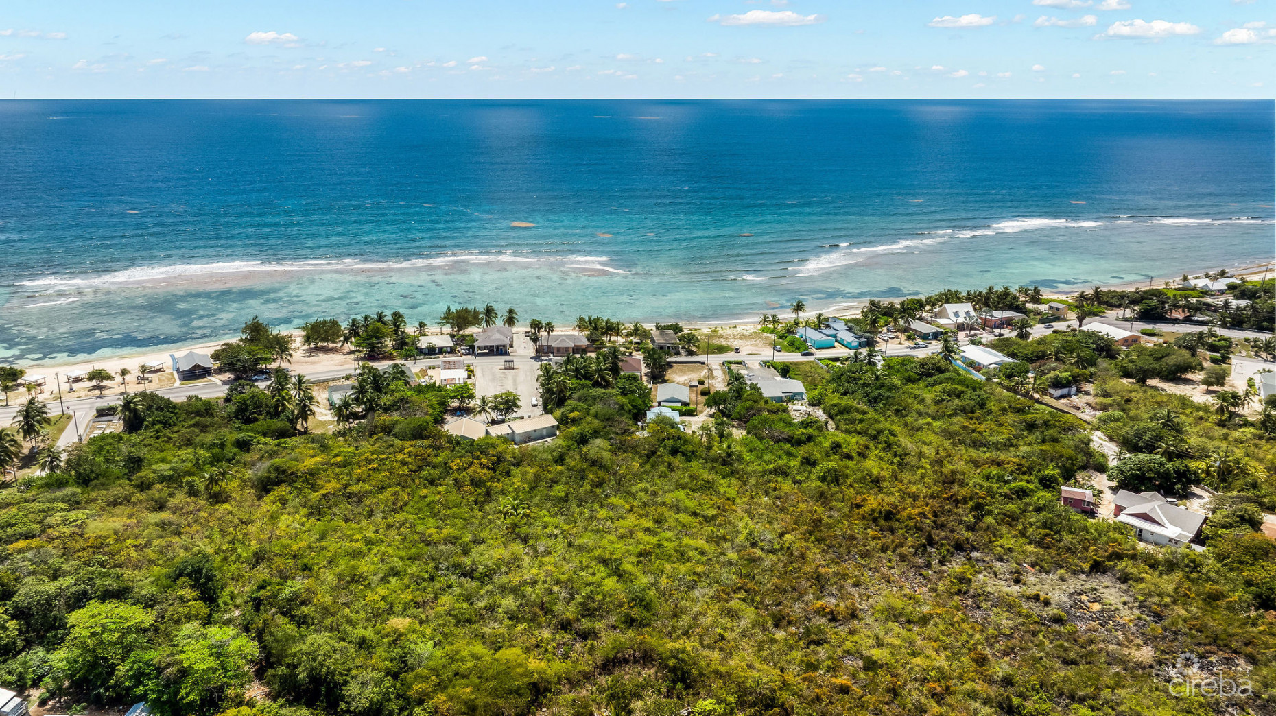 CHARMING OCEANVIEW COTTAGE ACROSS FROM THE SEA ON EXPANSIVE 0.89 ACRE LOT